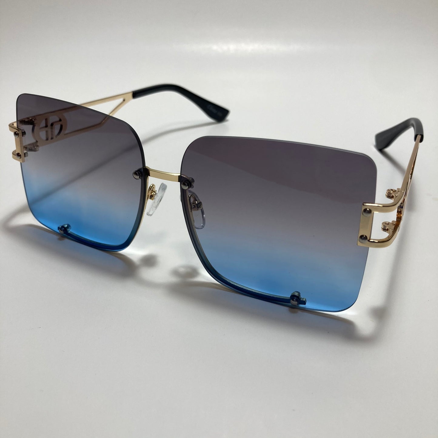 womens oversize square black and blue rimless sunglasses