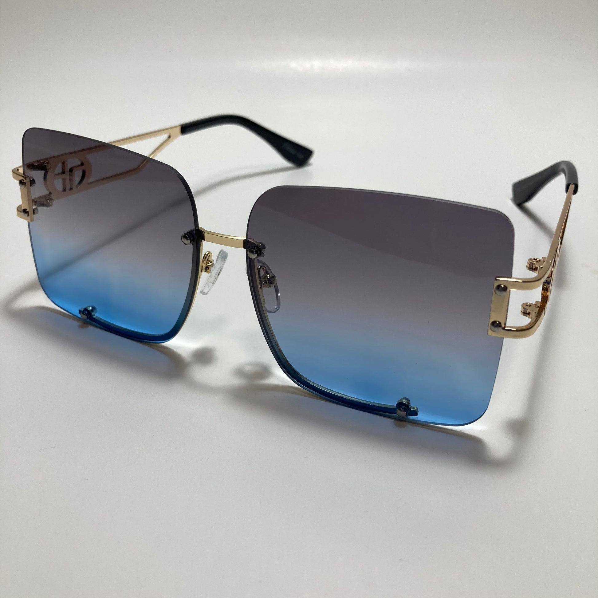 womens oversize square black and blue rimless sunglasses