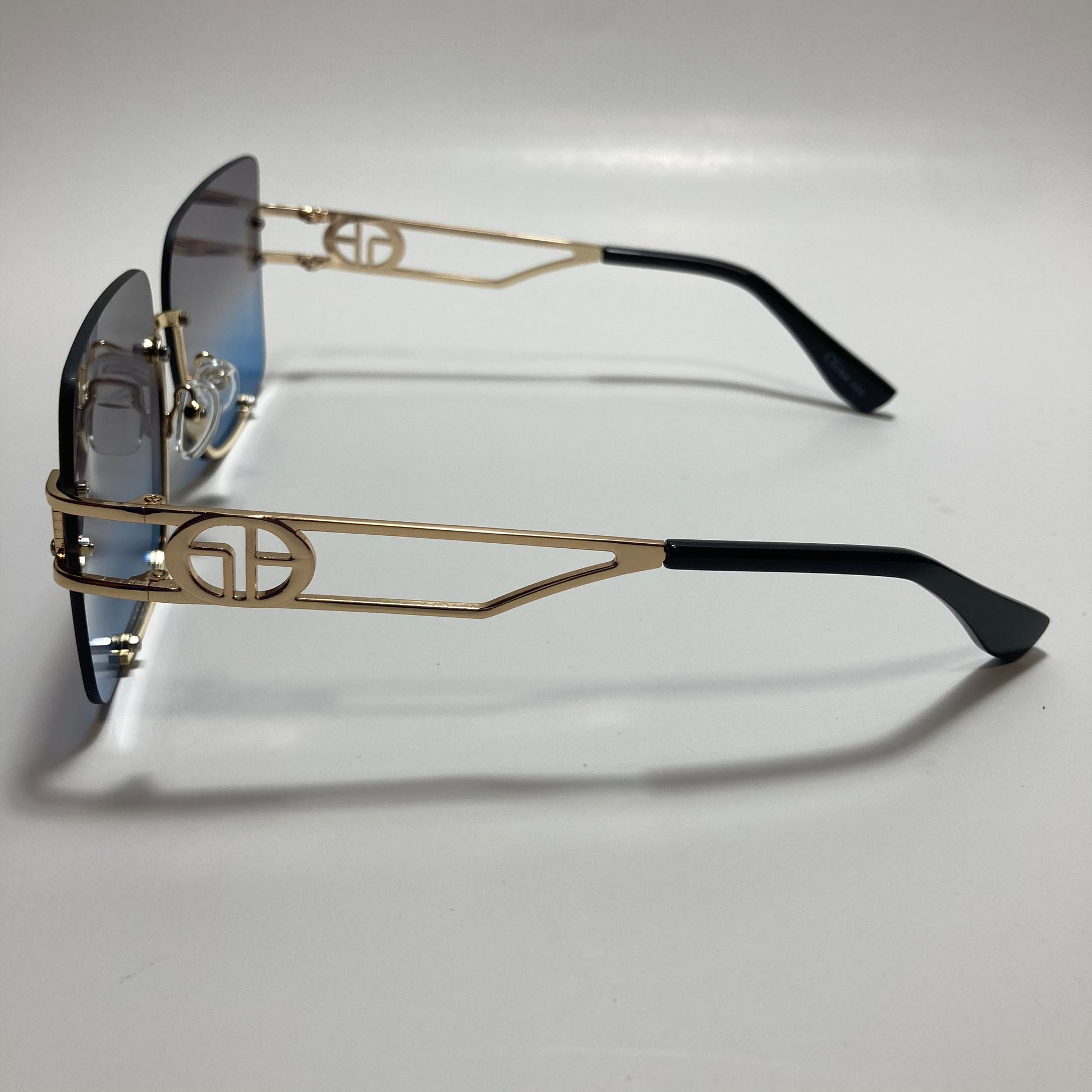 womens oversize square black and blue rimless sunglasses