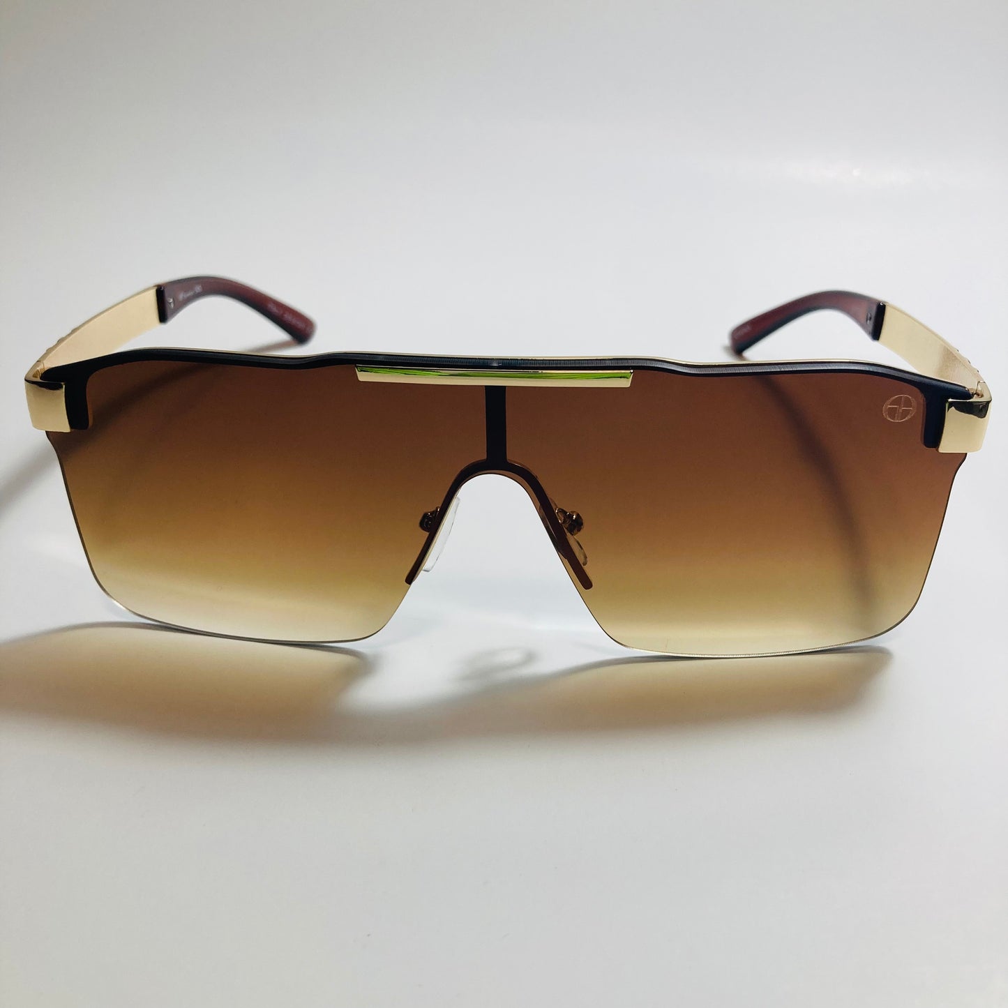 mens and womens brown and gold shield sunglasses
