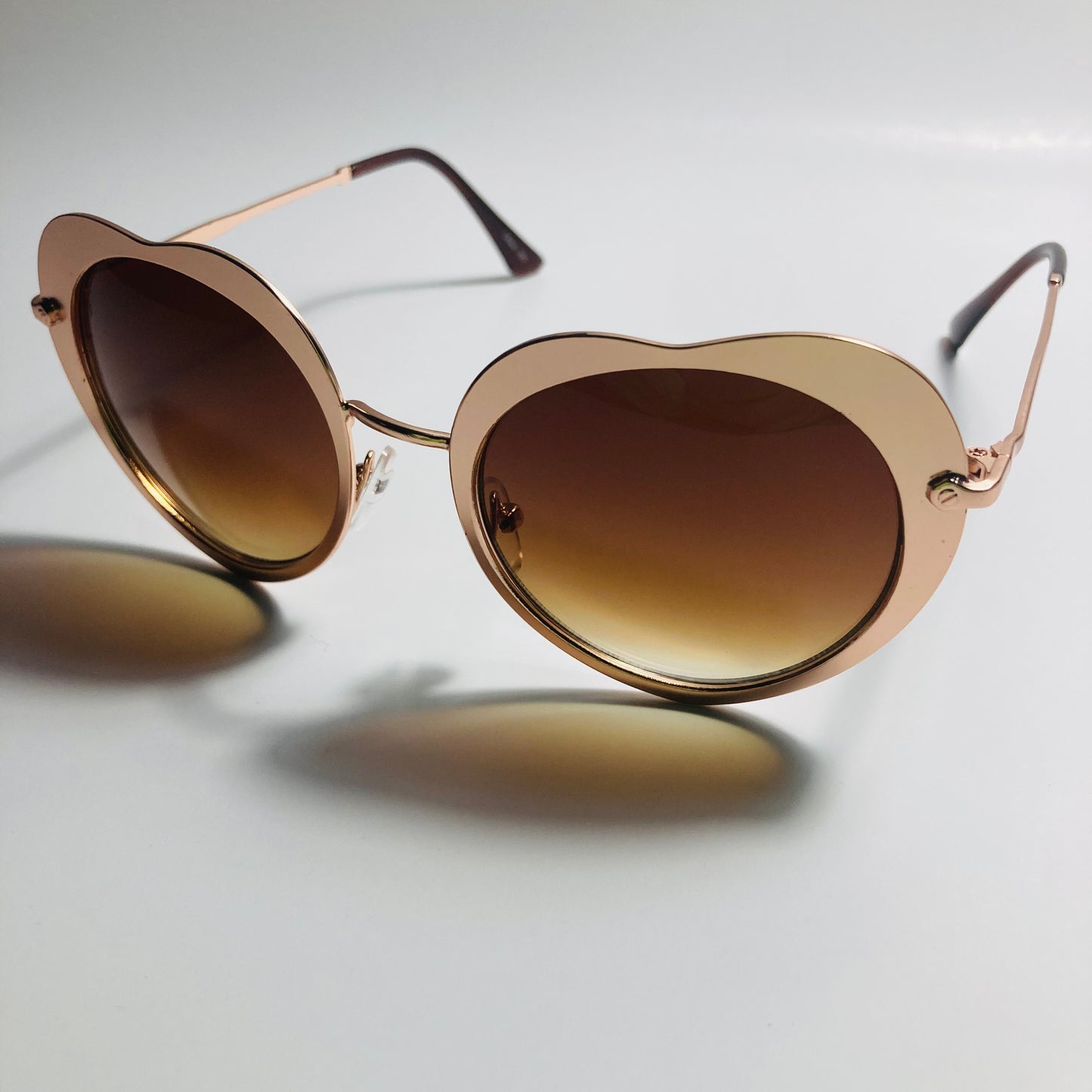womens brown and gold heart shape sunglasses