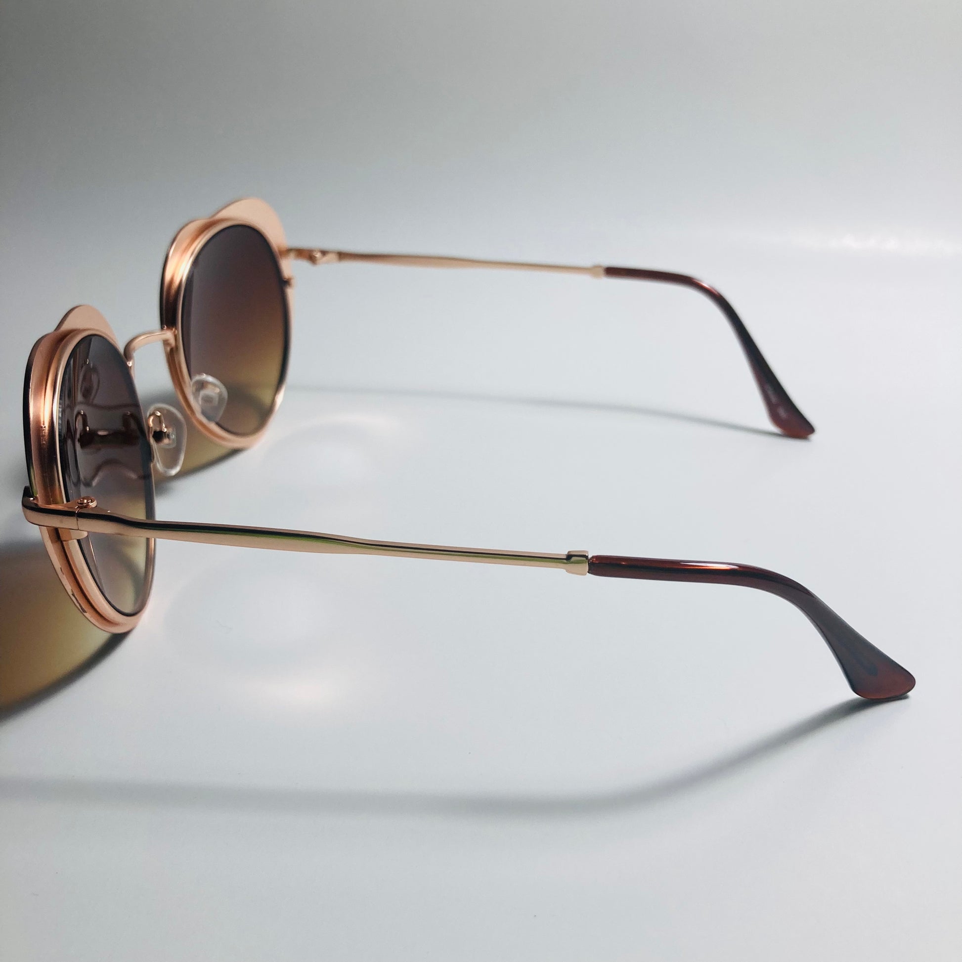 womens brown and gold heart shape sunglasses