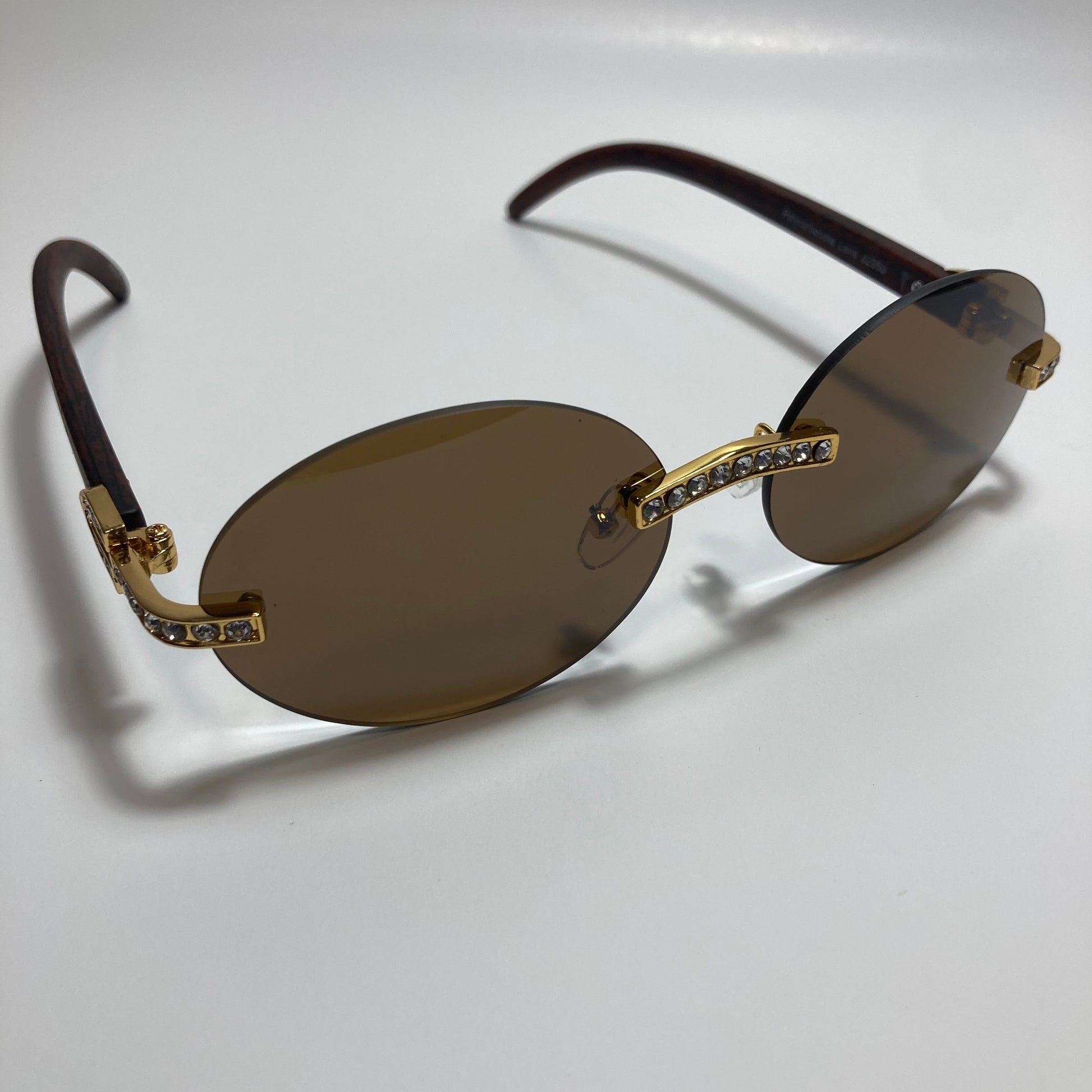 mens and womens rimless round gold diamond sunglasses with brown lenses