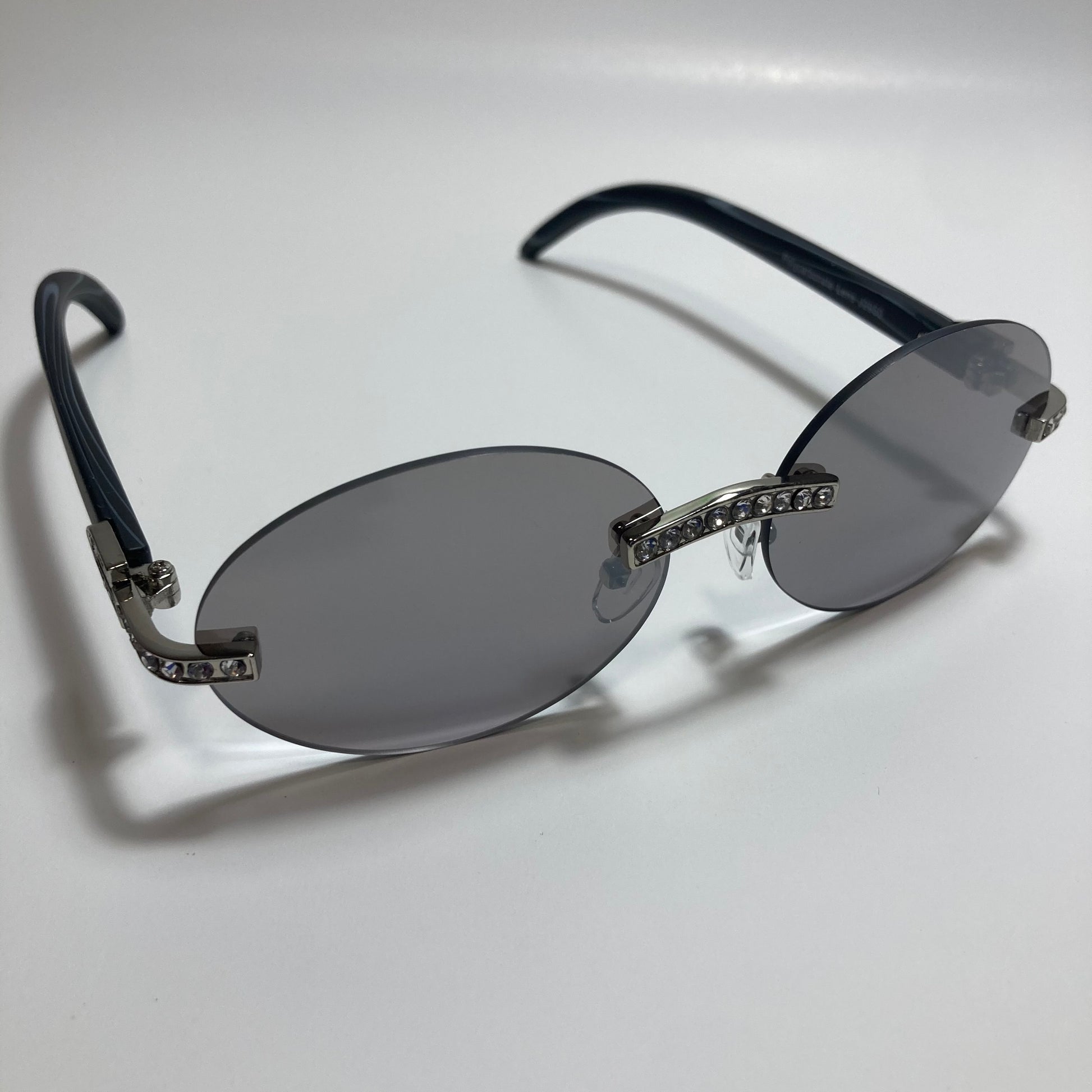 mens and womens rimless round silver diamond sunglasses with gray lenses