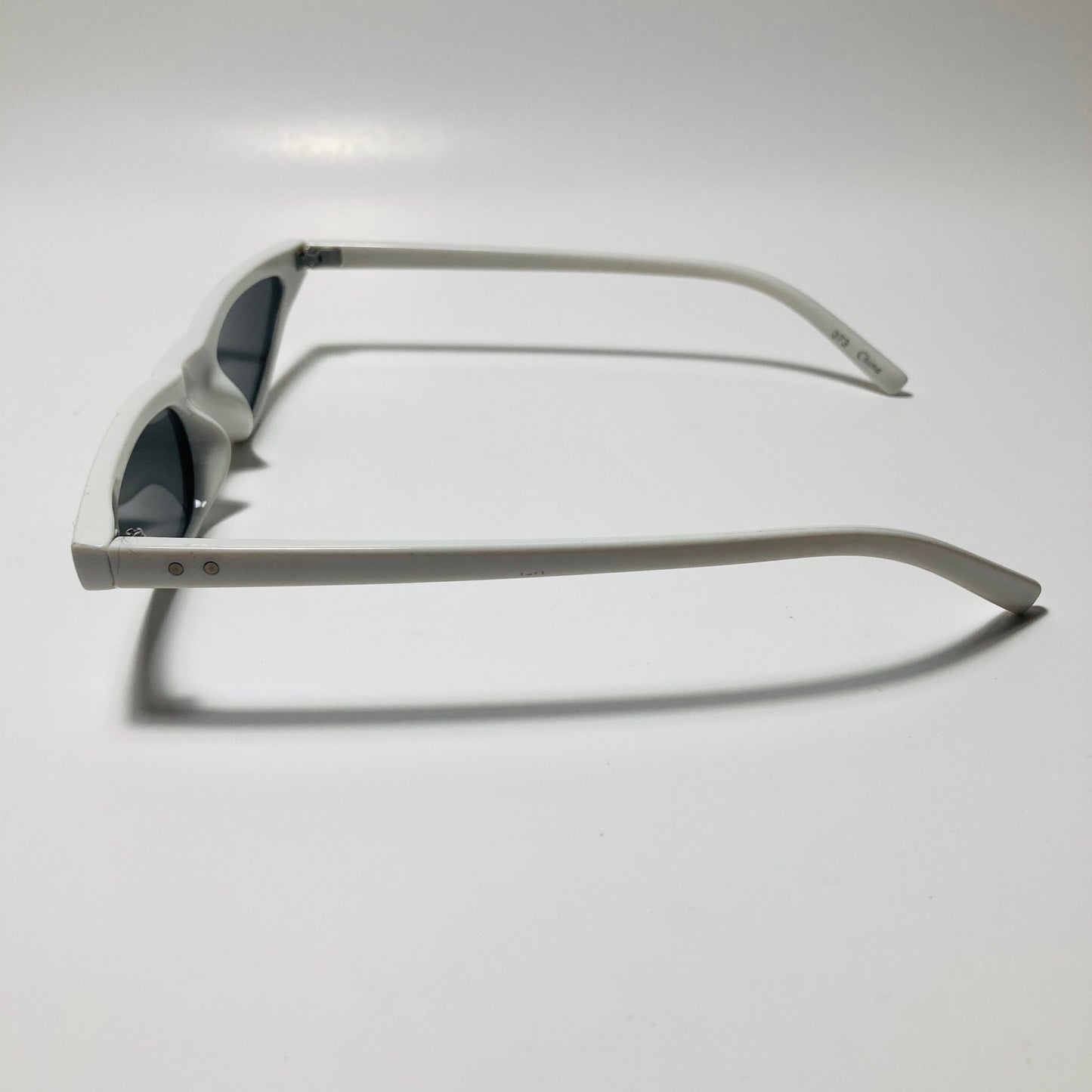 womens white and black skinny cat eye sunglasses