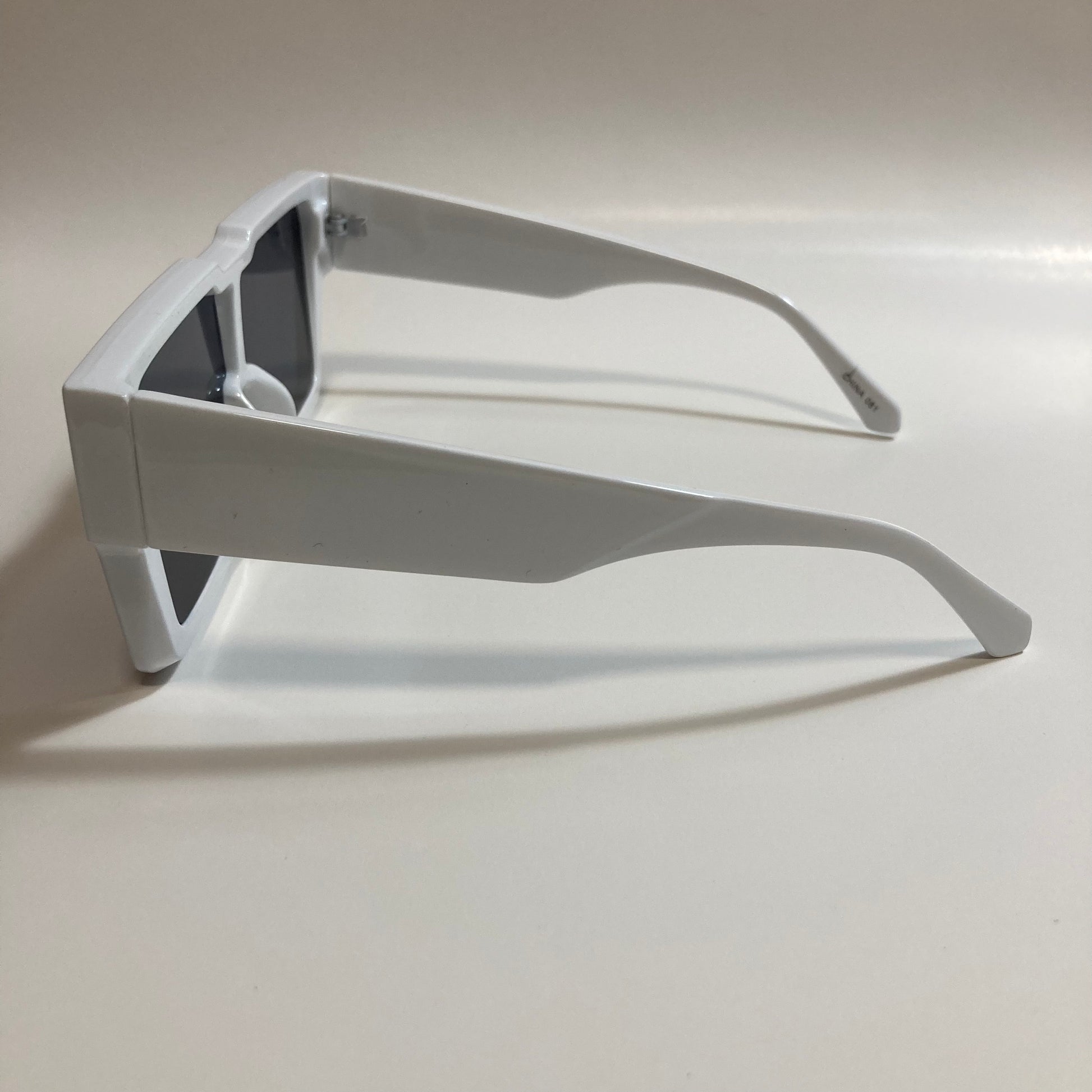 mens and womens black and white oversize square sunglasses