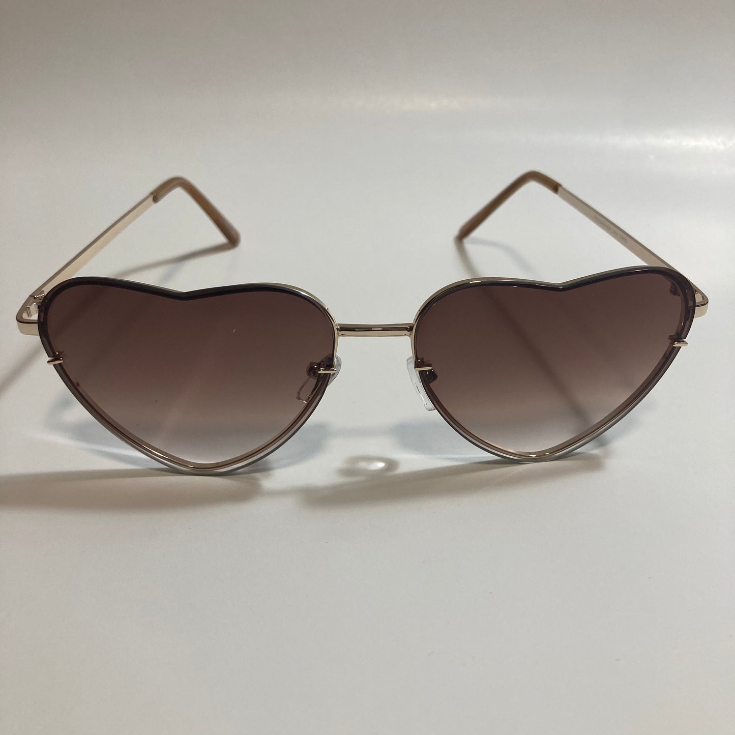 brown and gold heart shape sunglasses