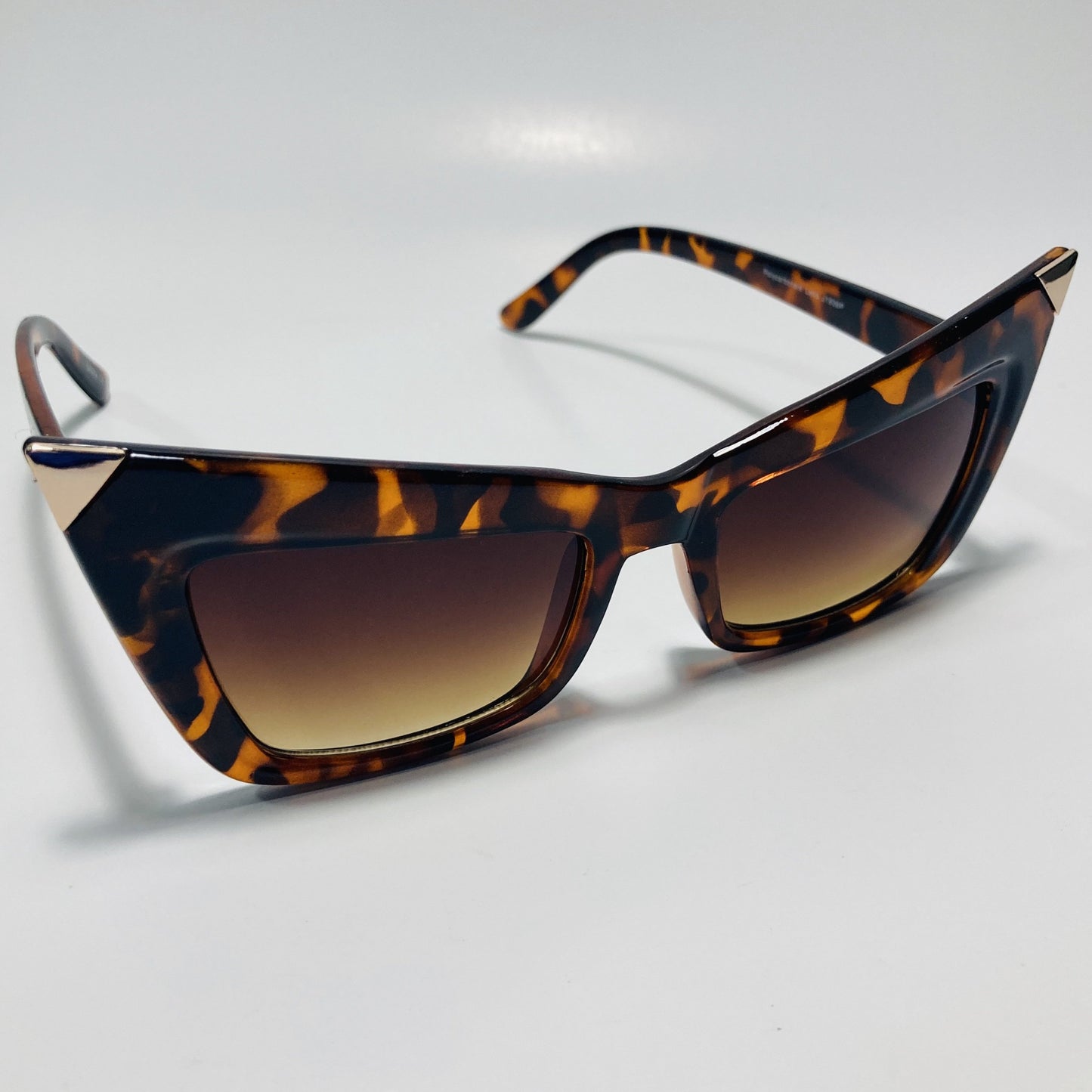 brown goth sunglasses