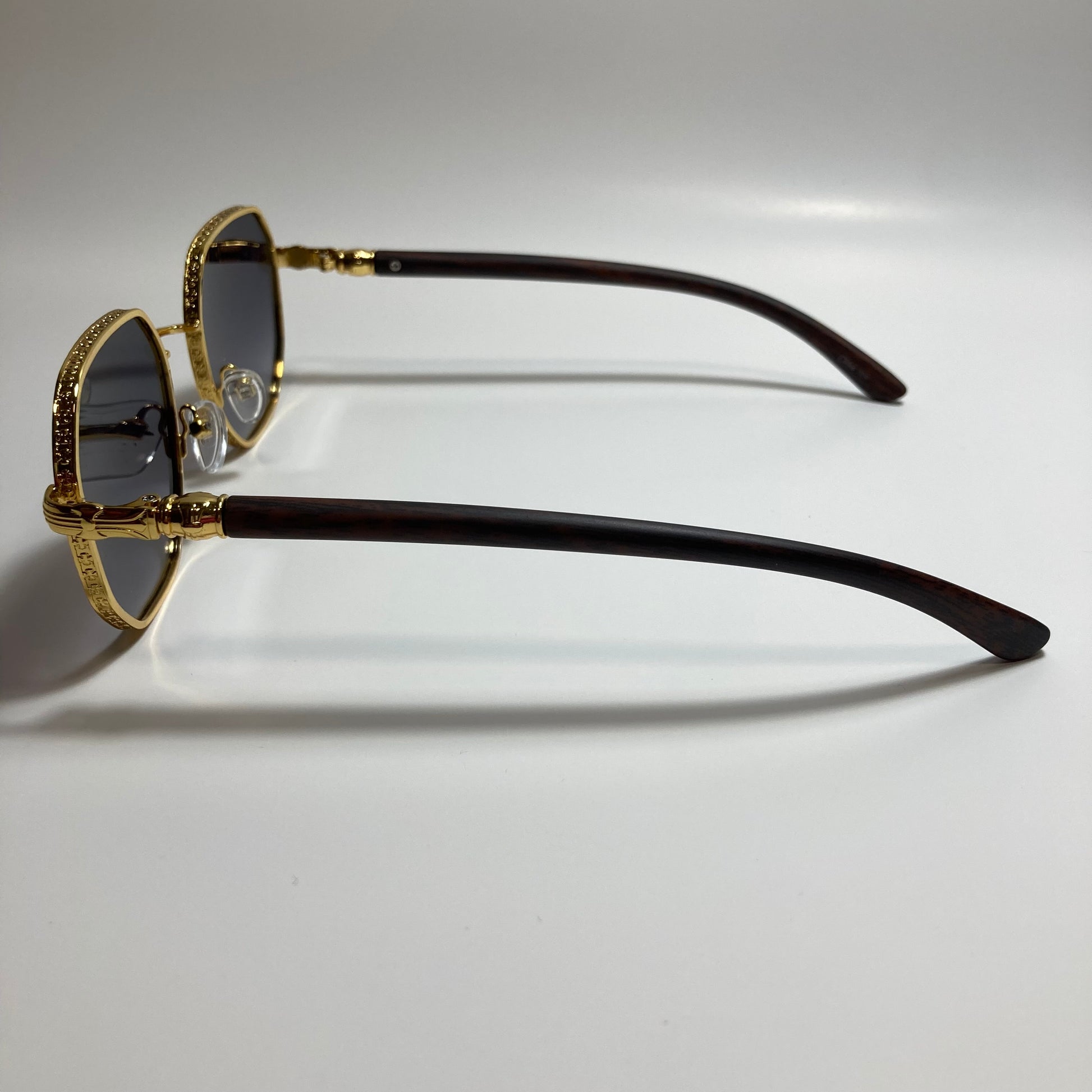 mens and womens gold and black square sunglasses