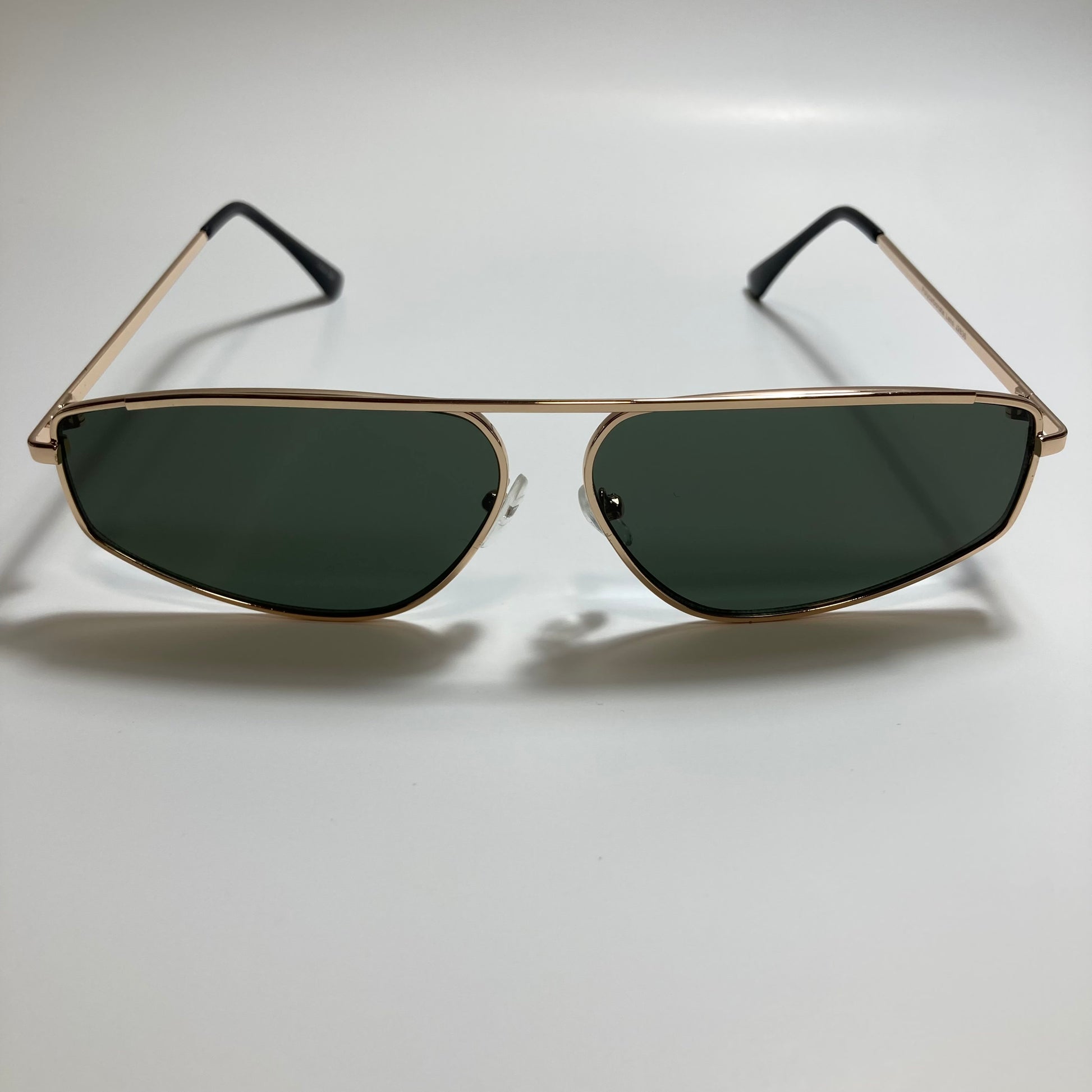 mens and womens green and gold futuristic sunglasses