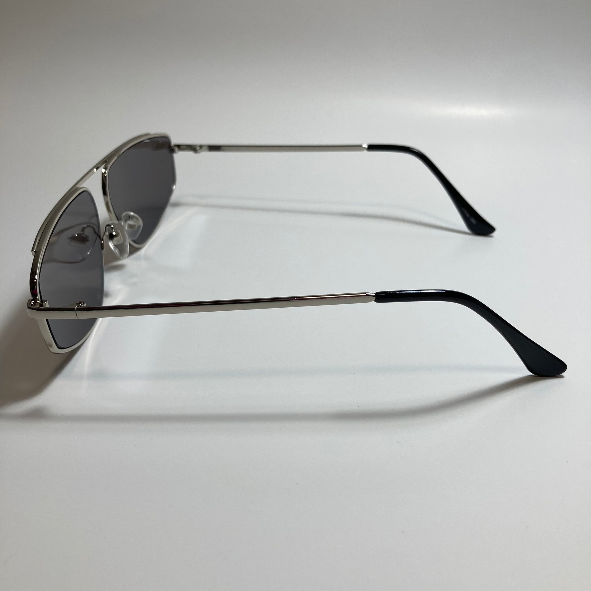 mens and womens gray and silver futuristic sunglasses