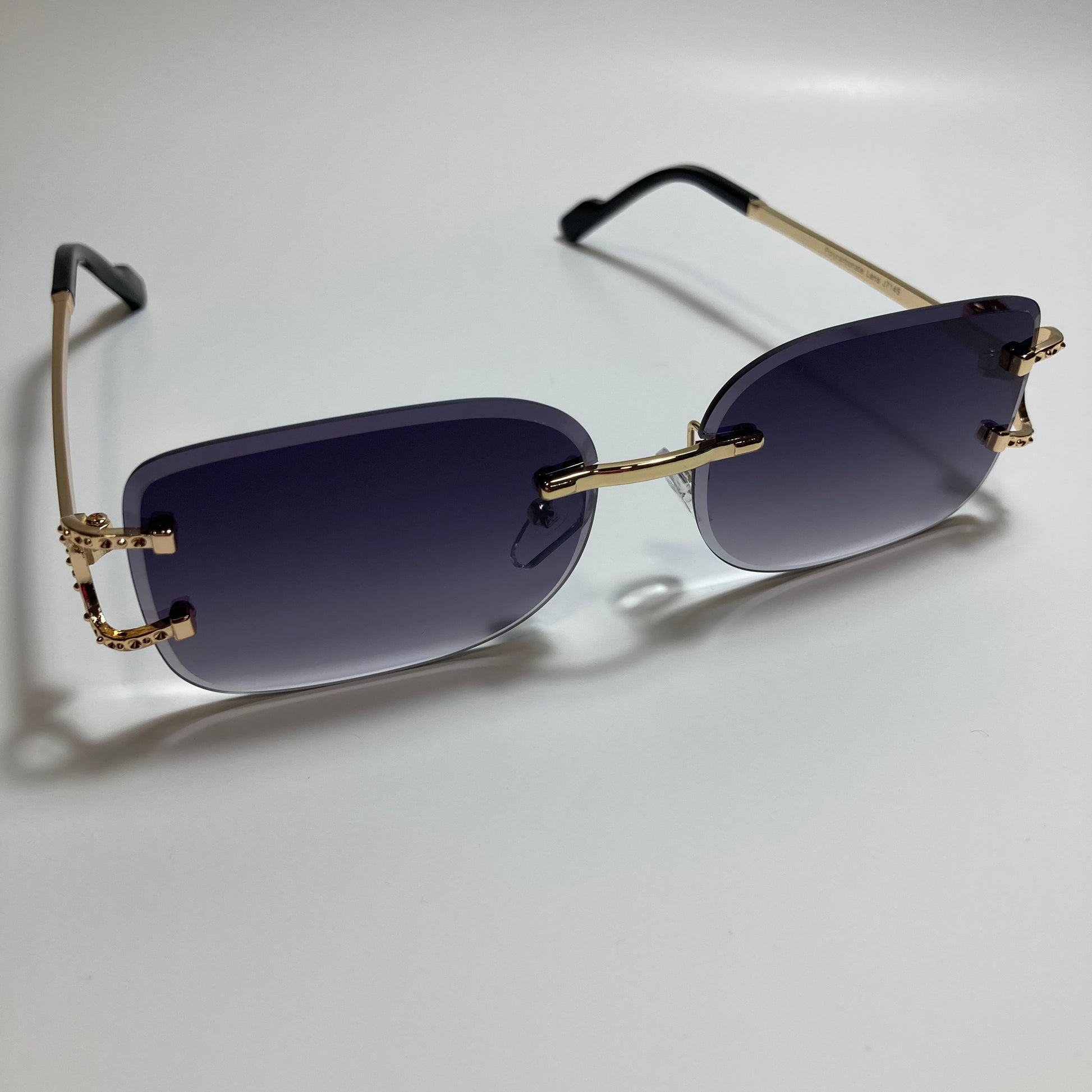 mens and womens black and gold rimless square sunglasses