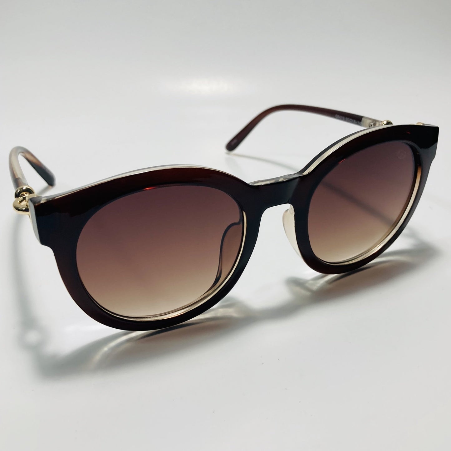 womens brown round sunglasses with brown lenses