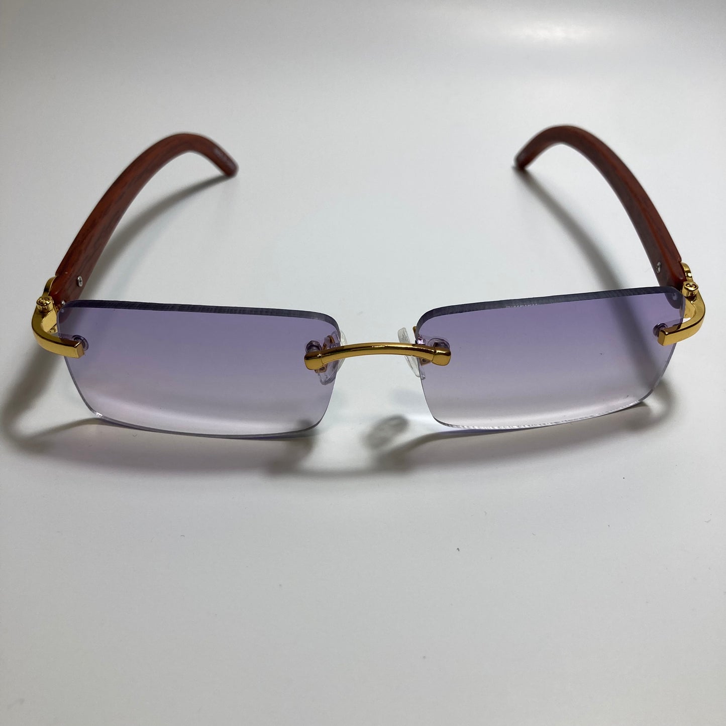 mens and womens purple rimless square sunglasses