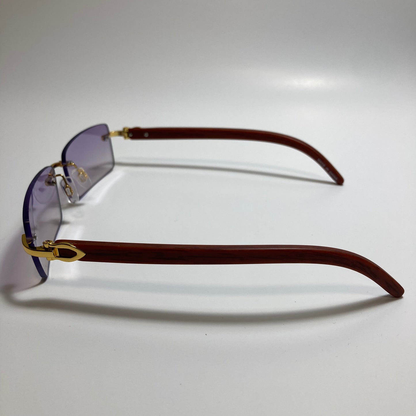 mens and womens purple rimless square sunglasses