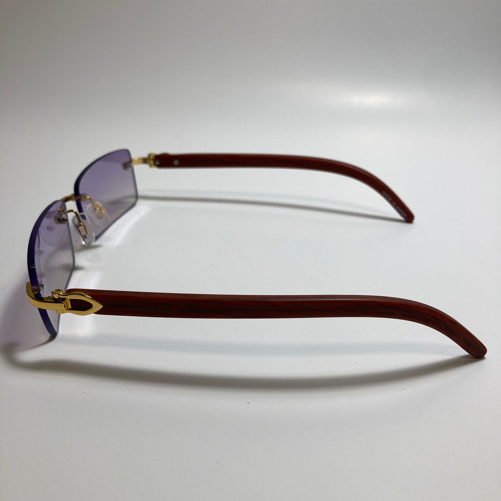 mens and womens purple rimless square sunglasses