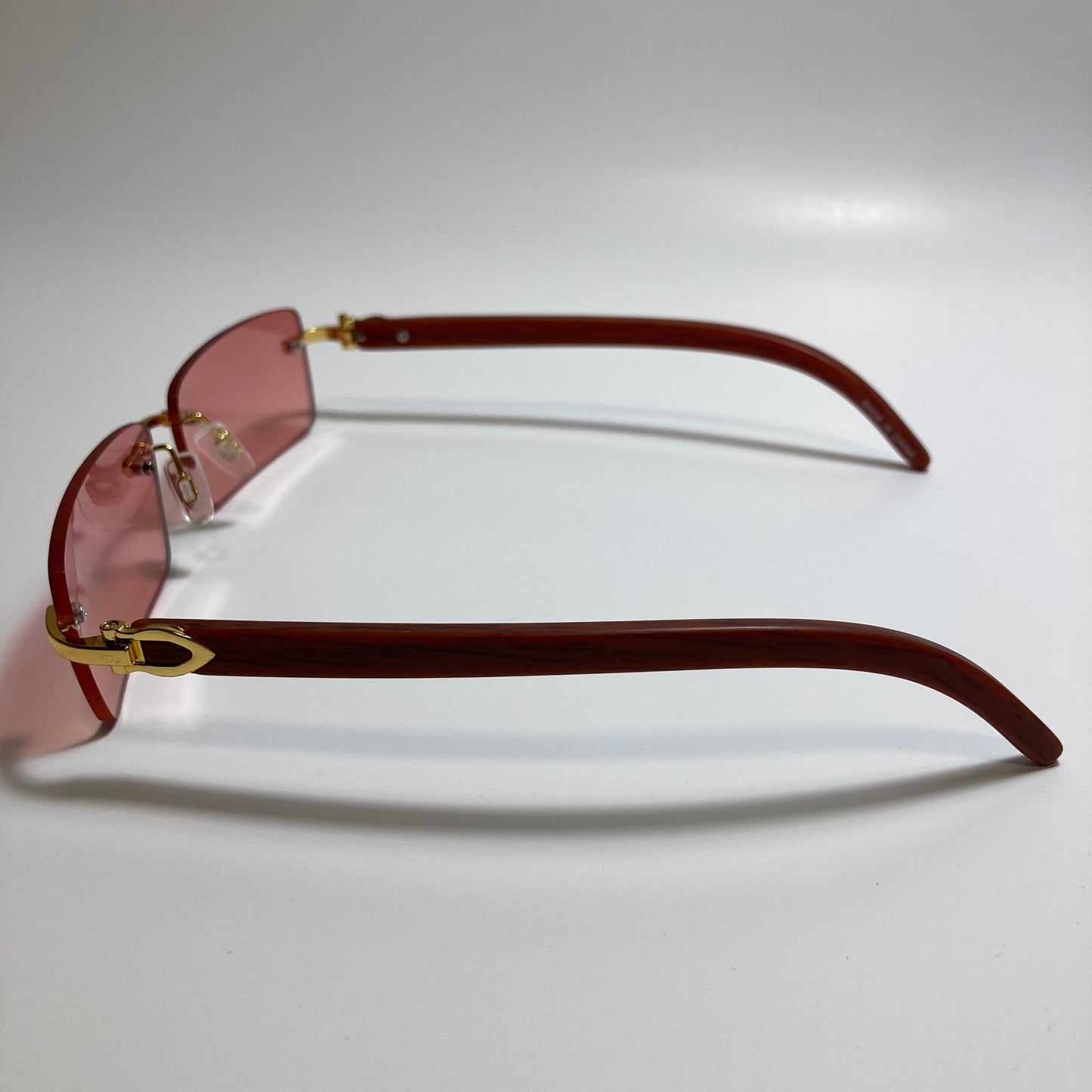 mens and womens red rimless square sunglasses
