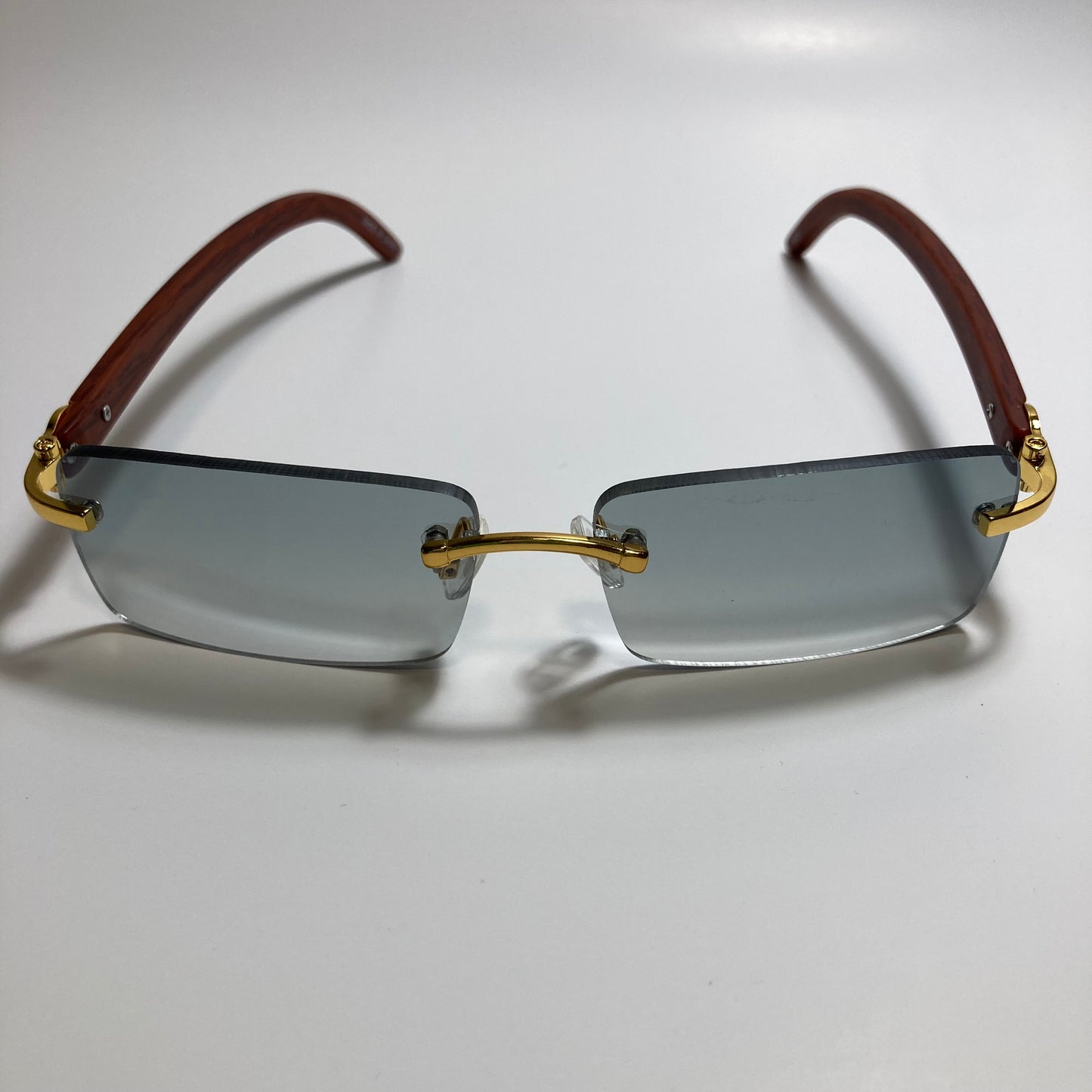 mens and womens green rimless square sunglasses