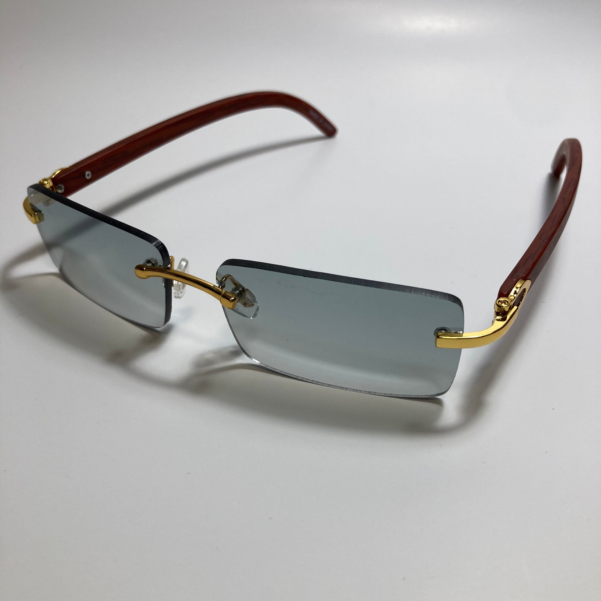 mens and womens green rimless square sunglasses