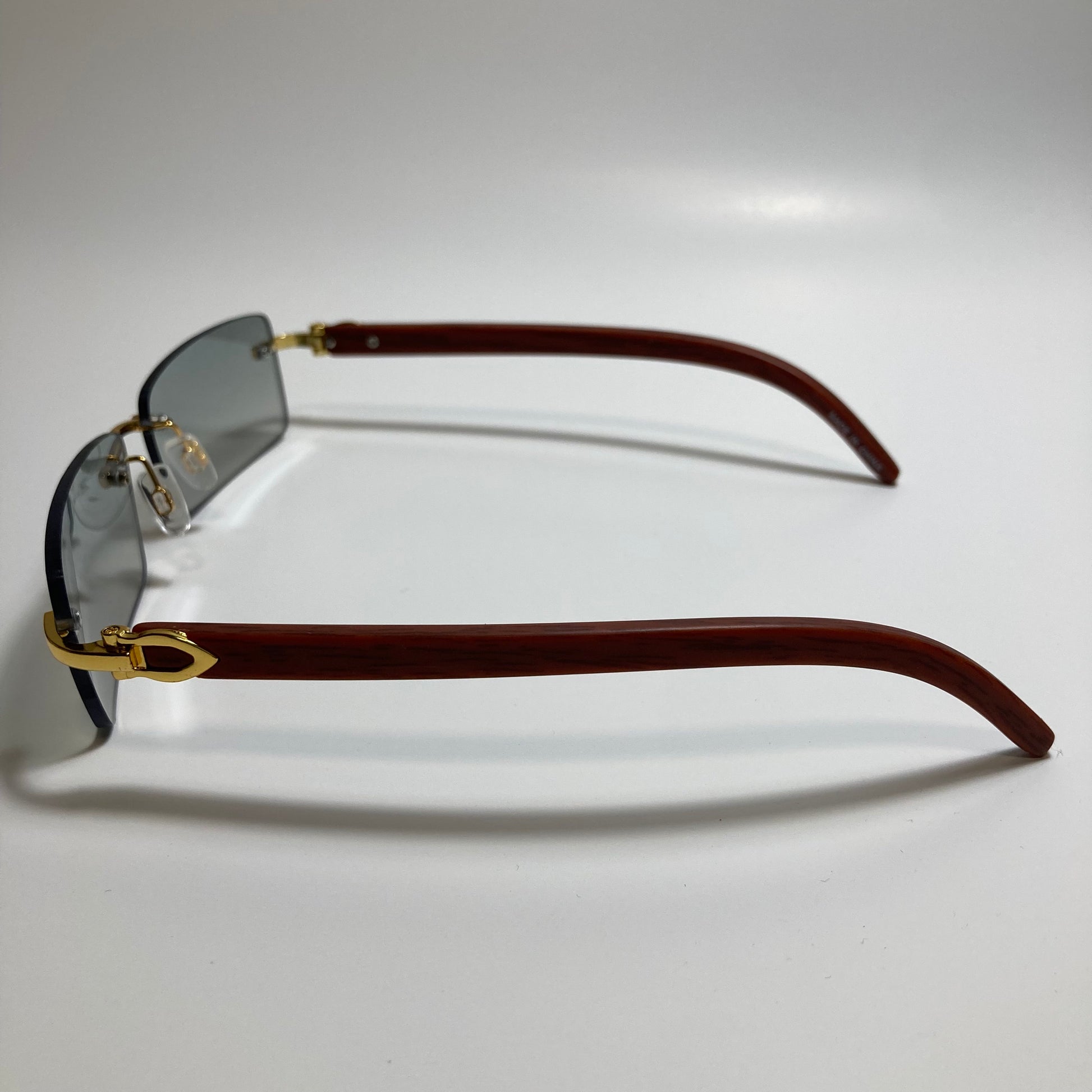 mens and womens green rimless square sunglasses