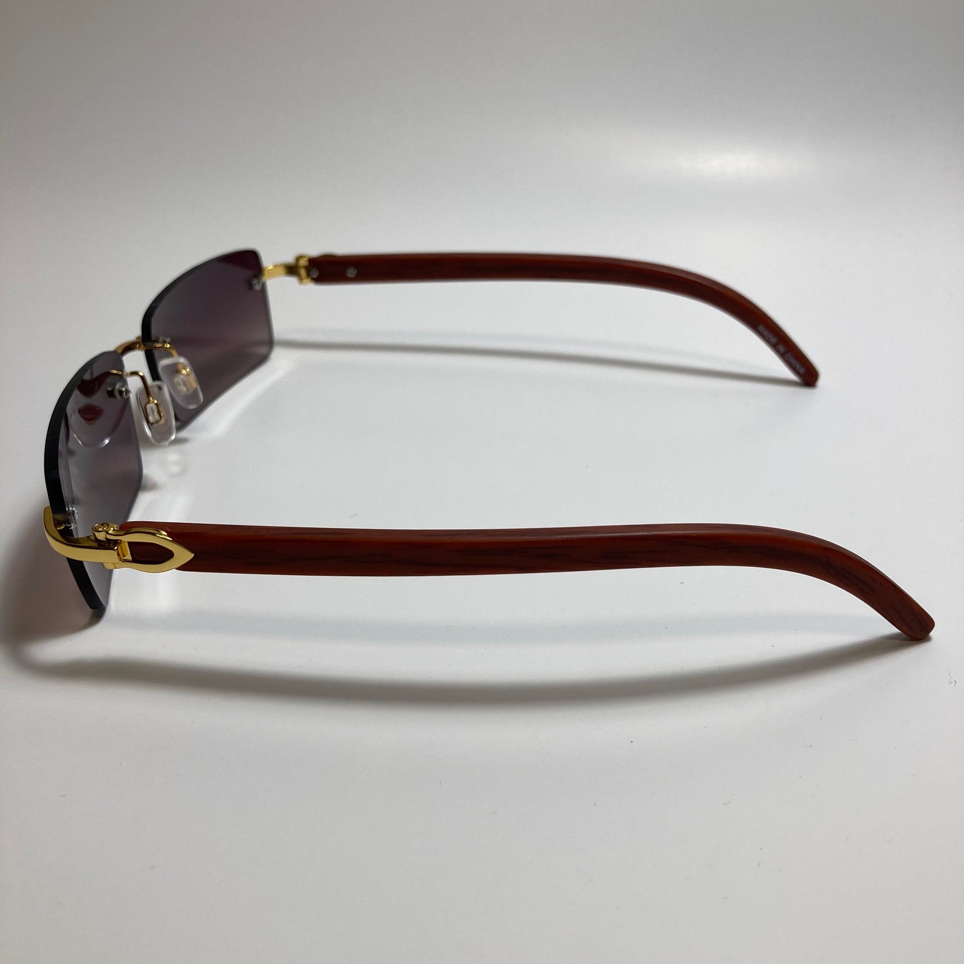 mens and womens black rimless square sunglasses