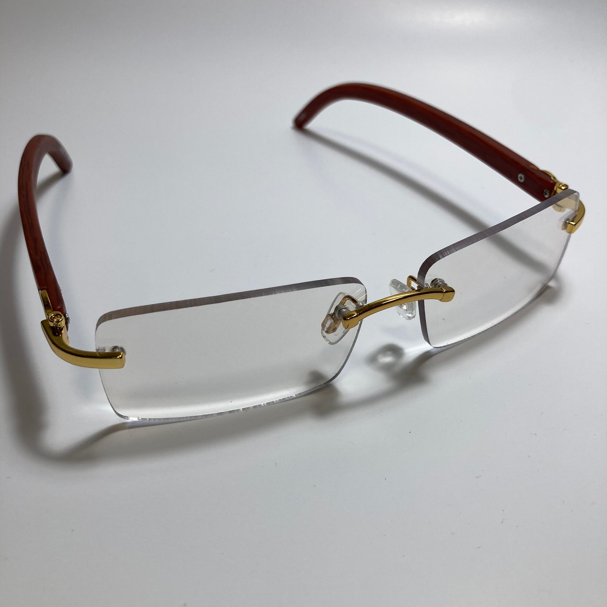 mens and womens clear rimless square sunglasses