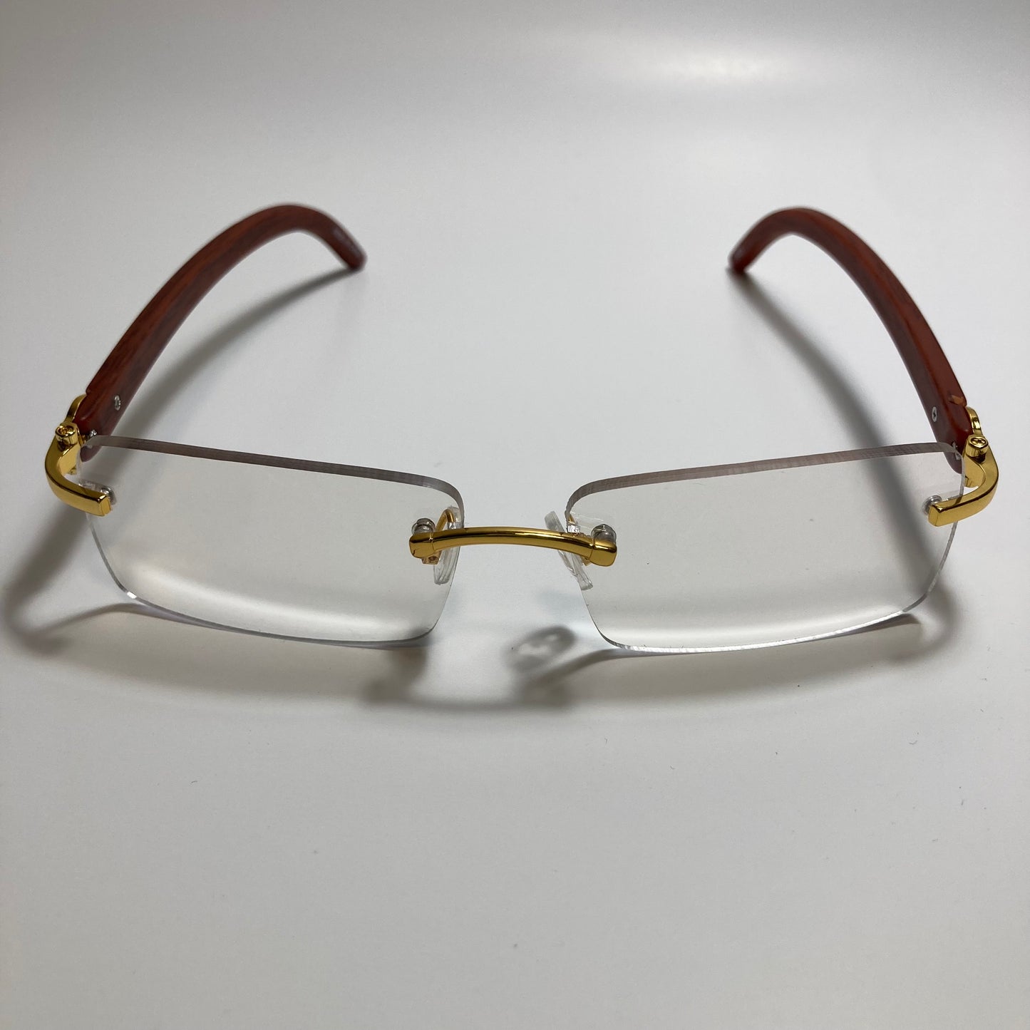mens and womens clear rimless square sunglasses