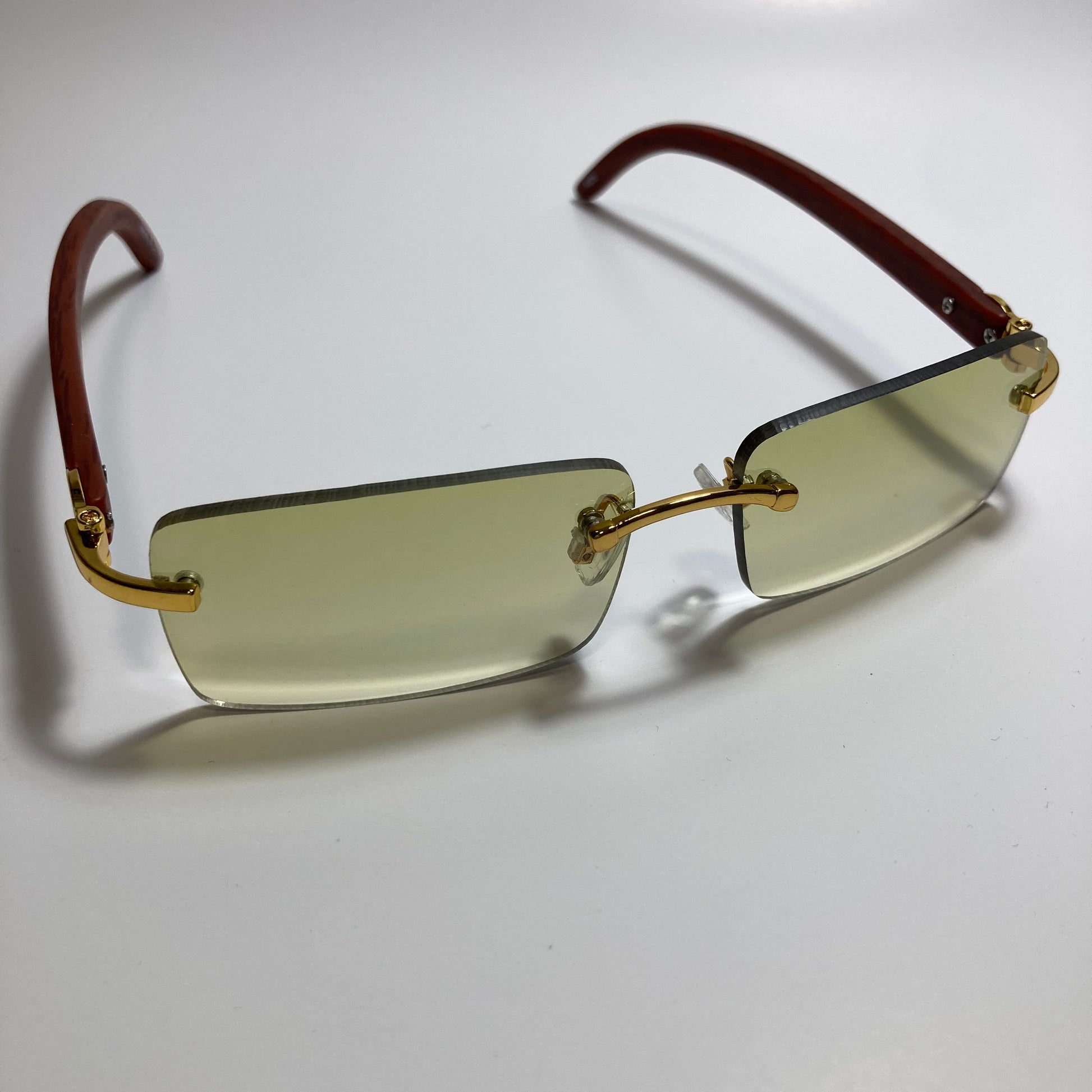mens and womens yellow rimless square sunglasses