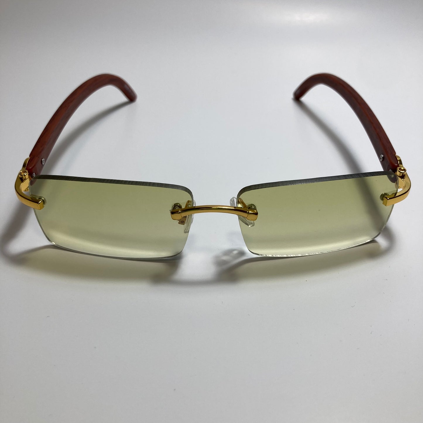 mens and womens yellow rimless square sunglasses