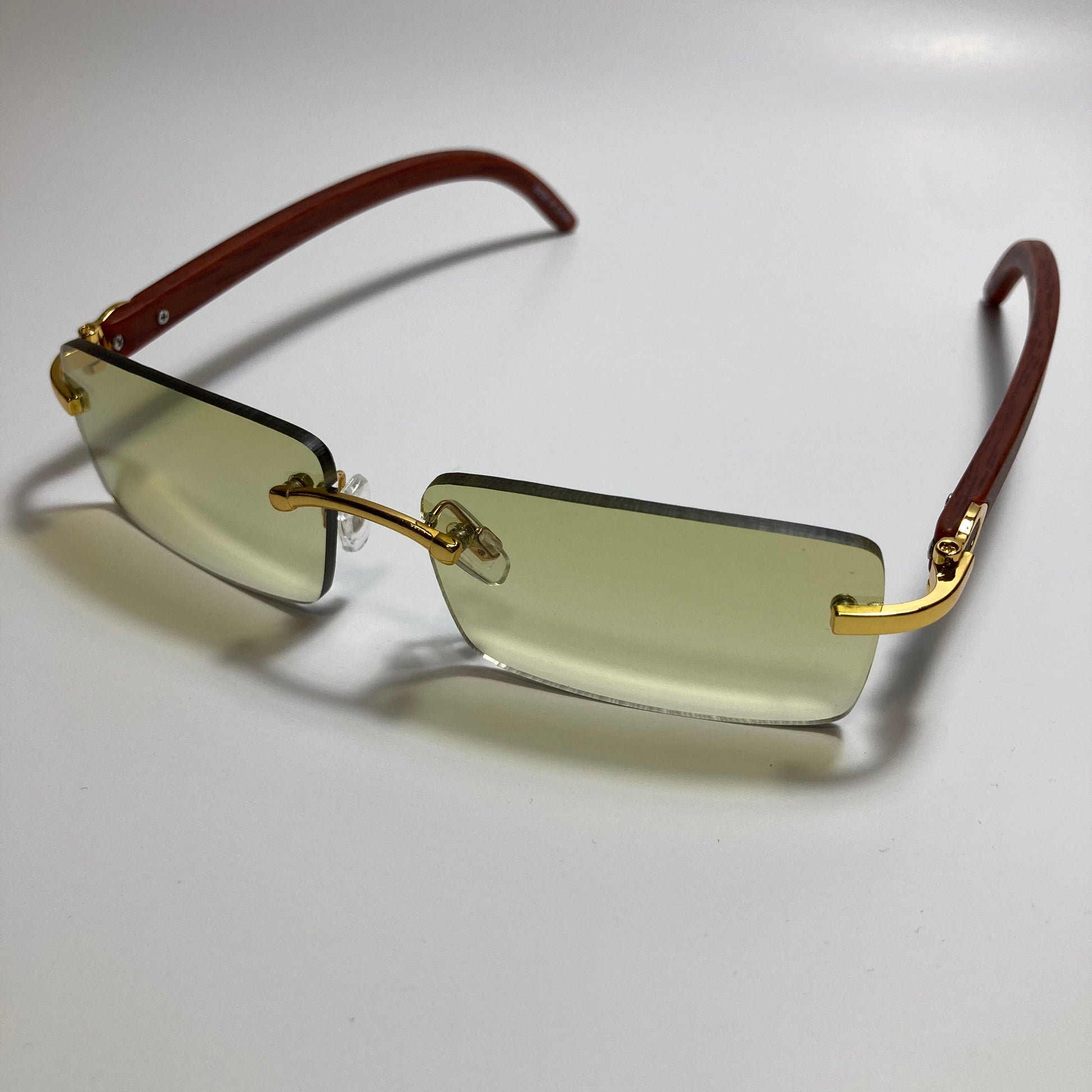 mens and womens yellow rimless square sunglasses
