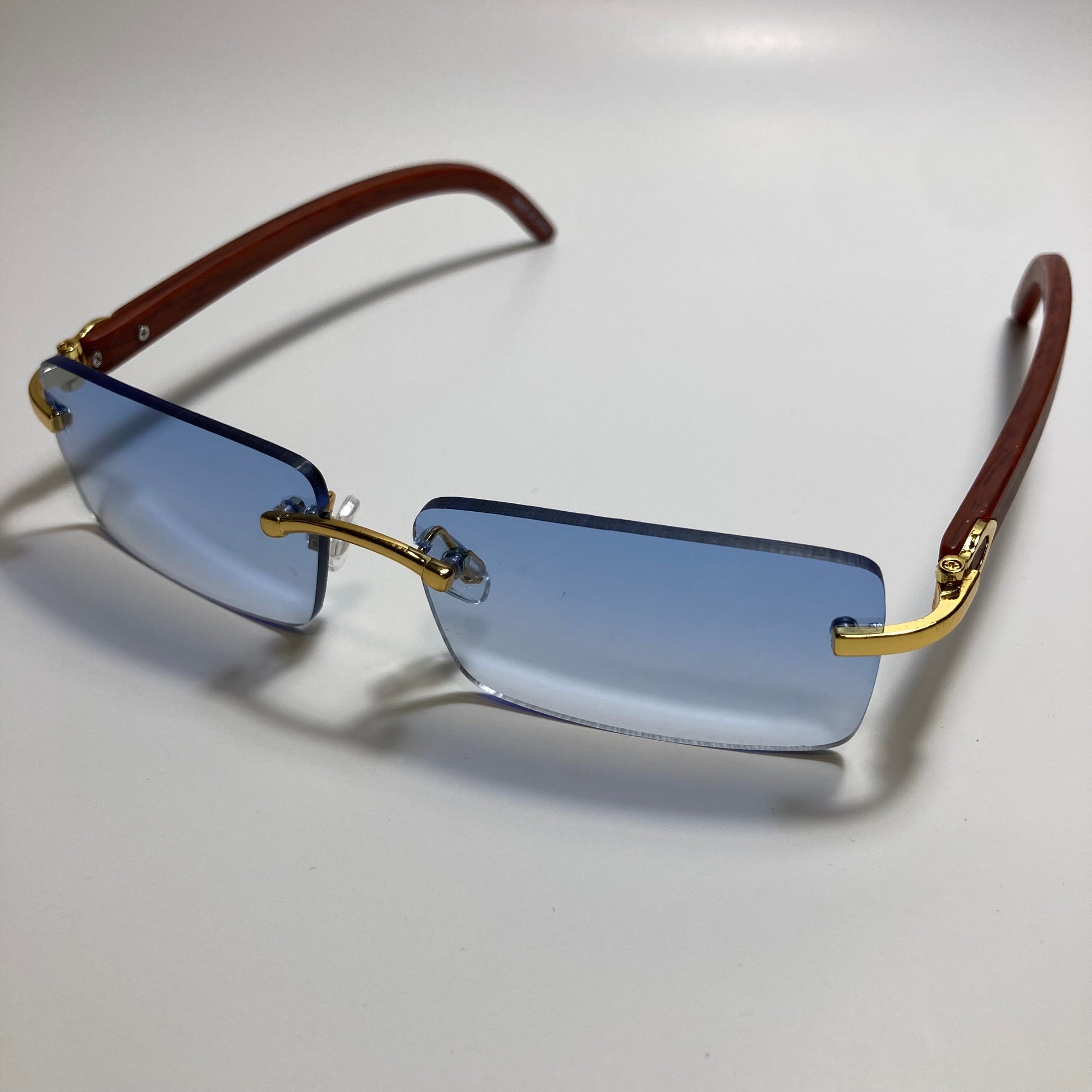 mens and womens blue rimless square sunglasses