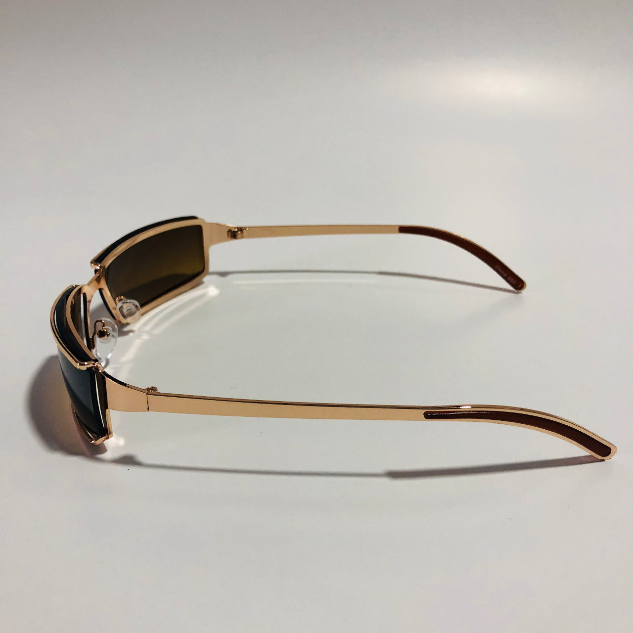 mens and womens gold wrap sunglasses with brown lenses