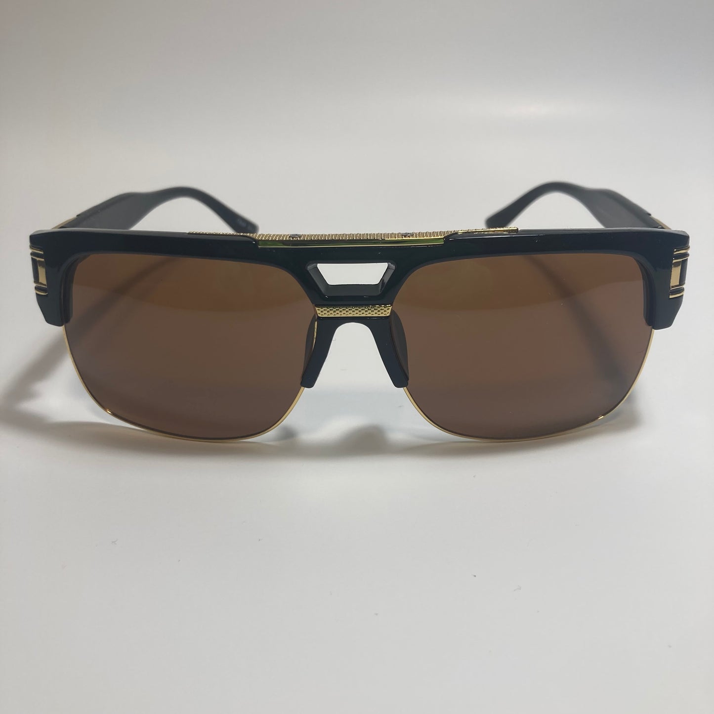 black, brown, and gold gazelle sunglasses 