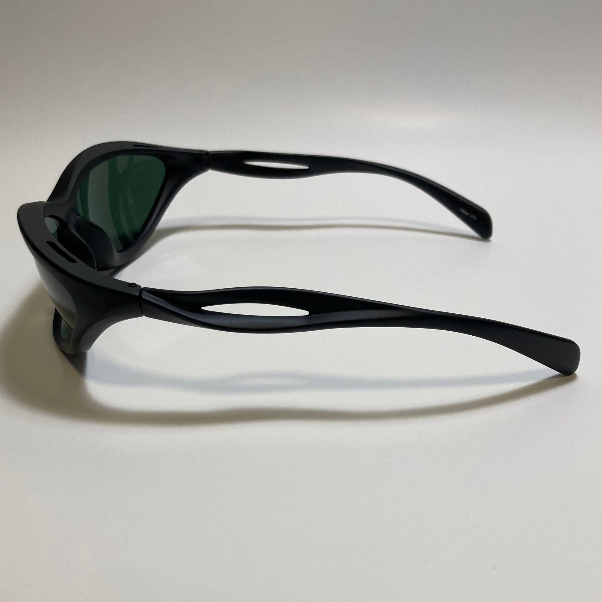 mens and womens matte black and green lens futuristic sunglasses
