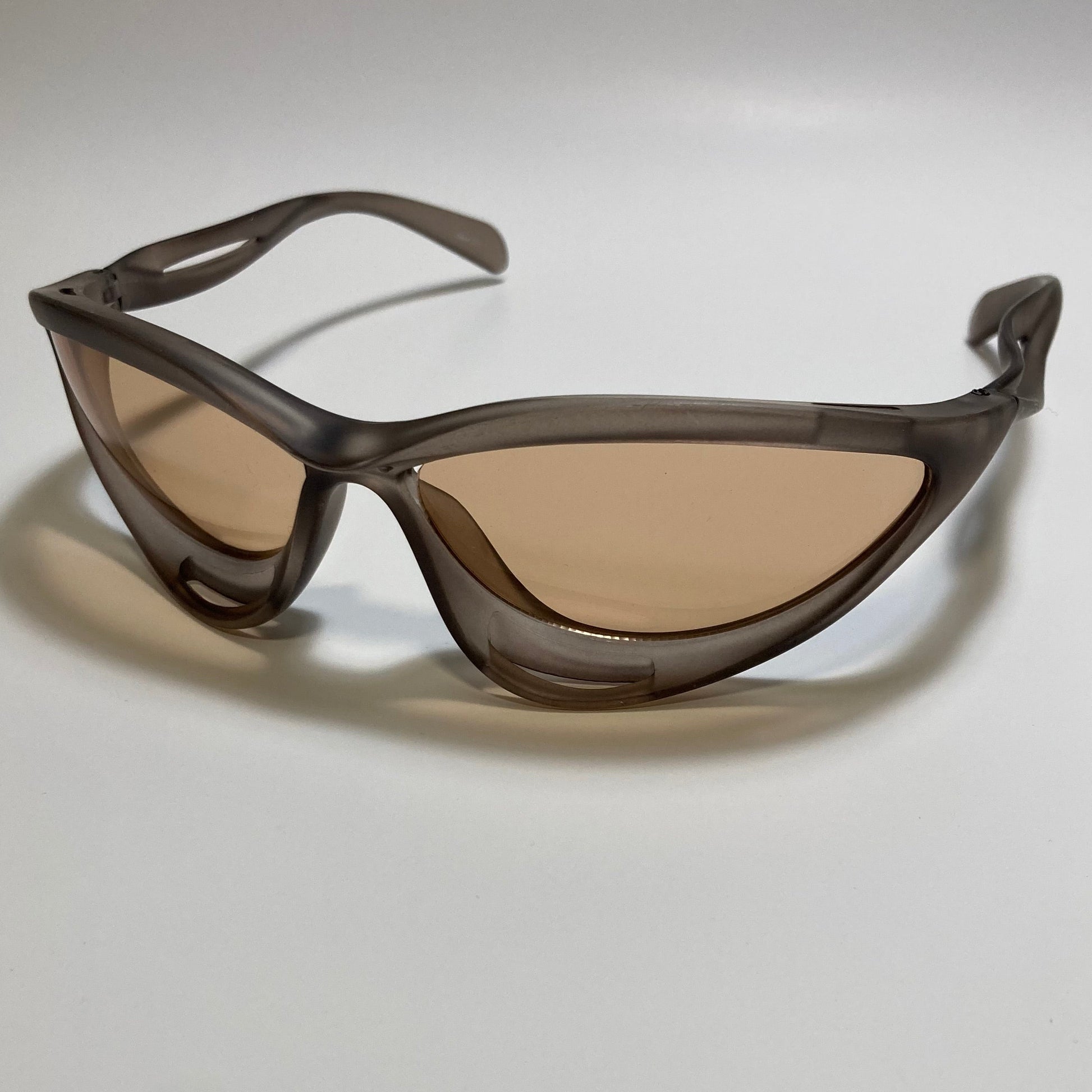 mens and womens clear brown and beige lens futuristic sunglasses