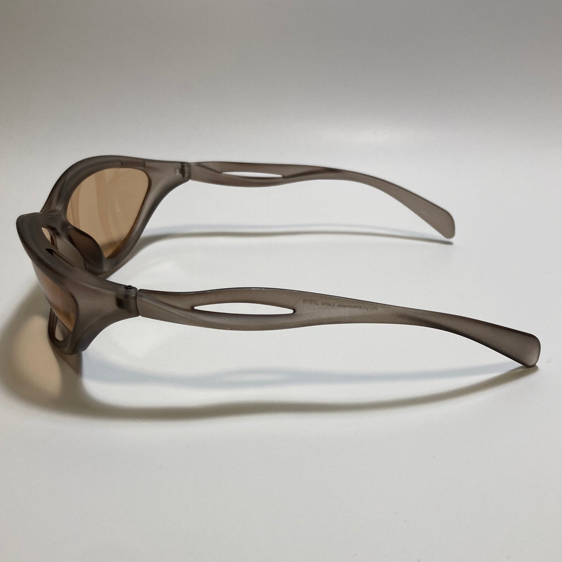 mens and womens clear brown and beige lens futuristic sunglasses