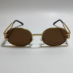 gold and brown mens and womens round sunglasses