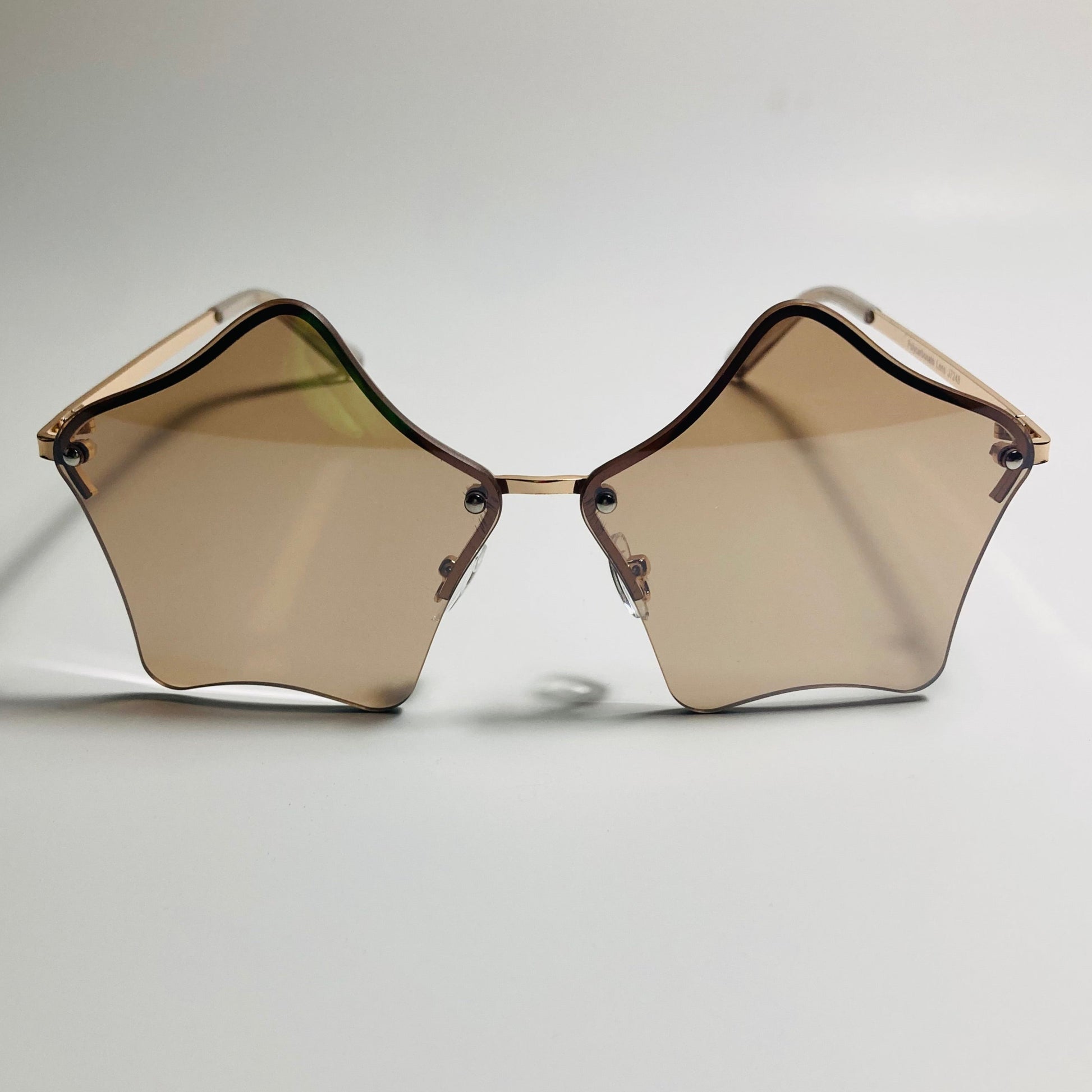 womens brown and gold star sunglasses with metal frame