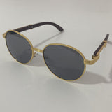 womens and mens gold and black round sunglasses