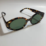 brown and green womens round sunglasses