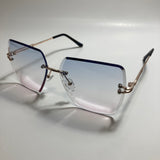 womens blue pink and gold rimless oversize sunglasses