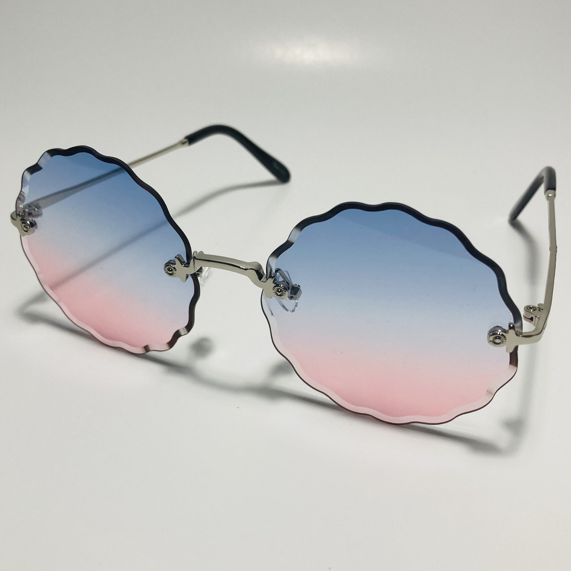 womens pink blue and silver rimless round sunglasses