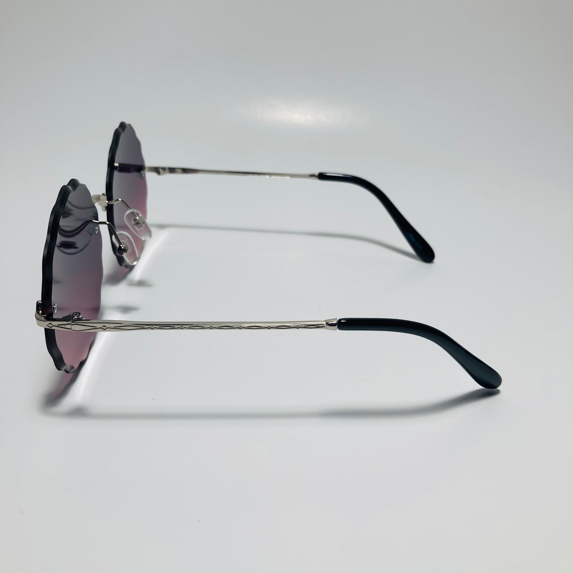 womens purple pink and silver rimless round sunglasses