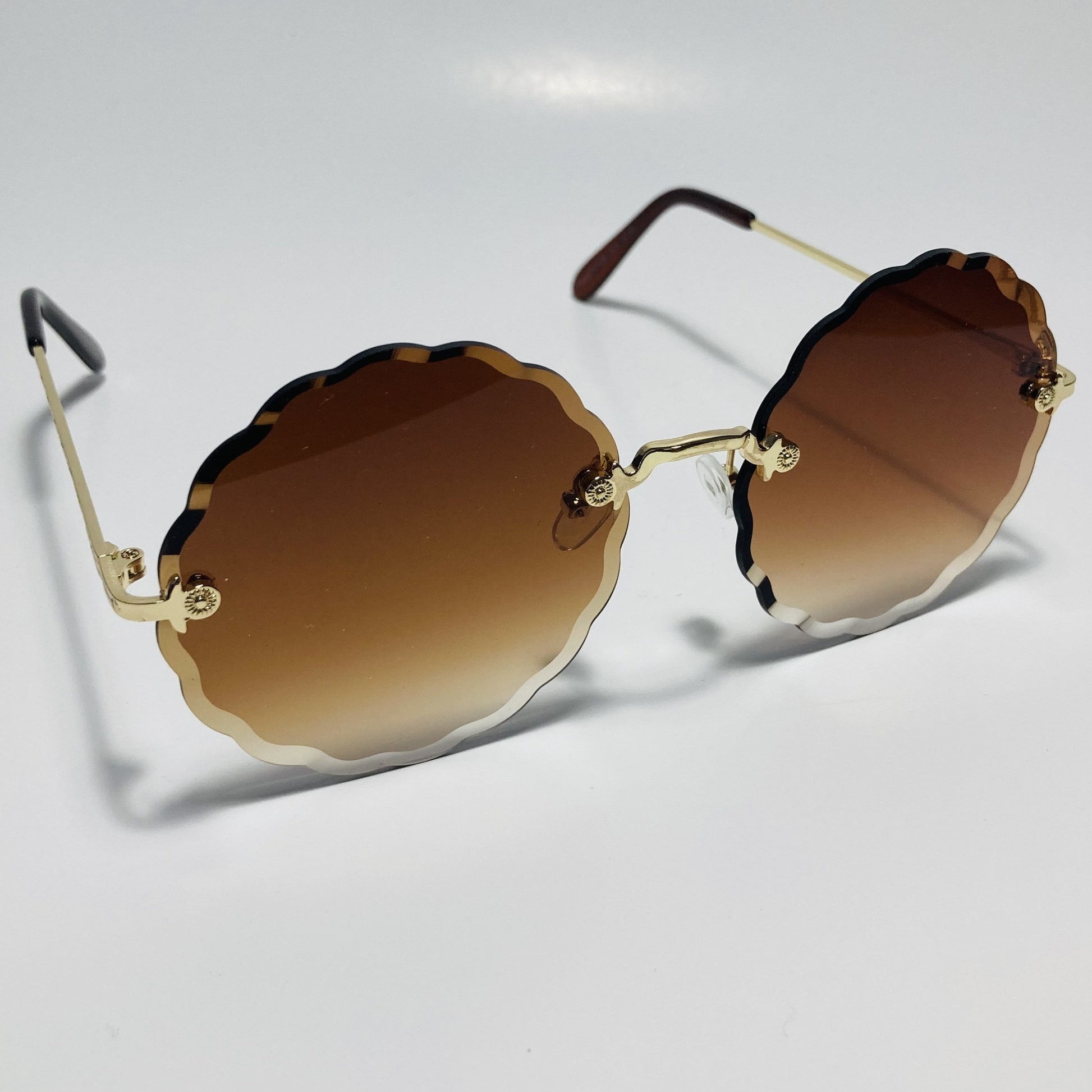 womens brown and gold rimless round sunglasses