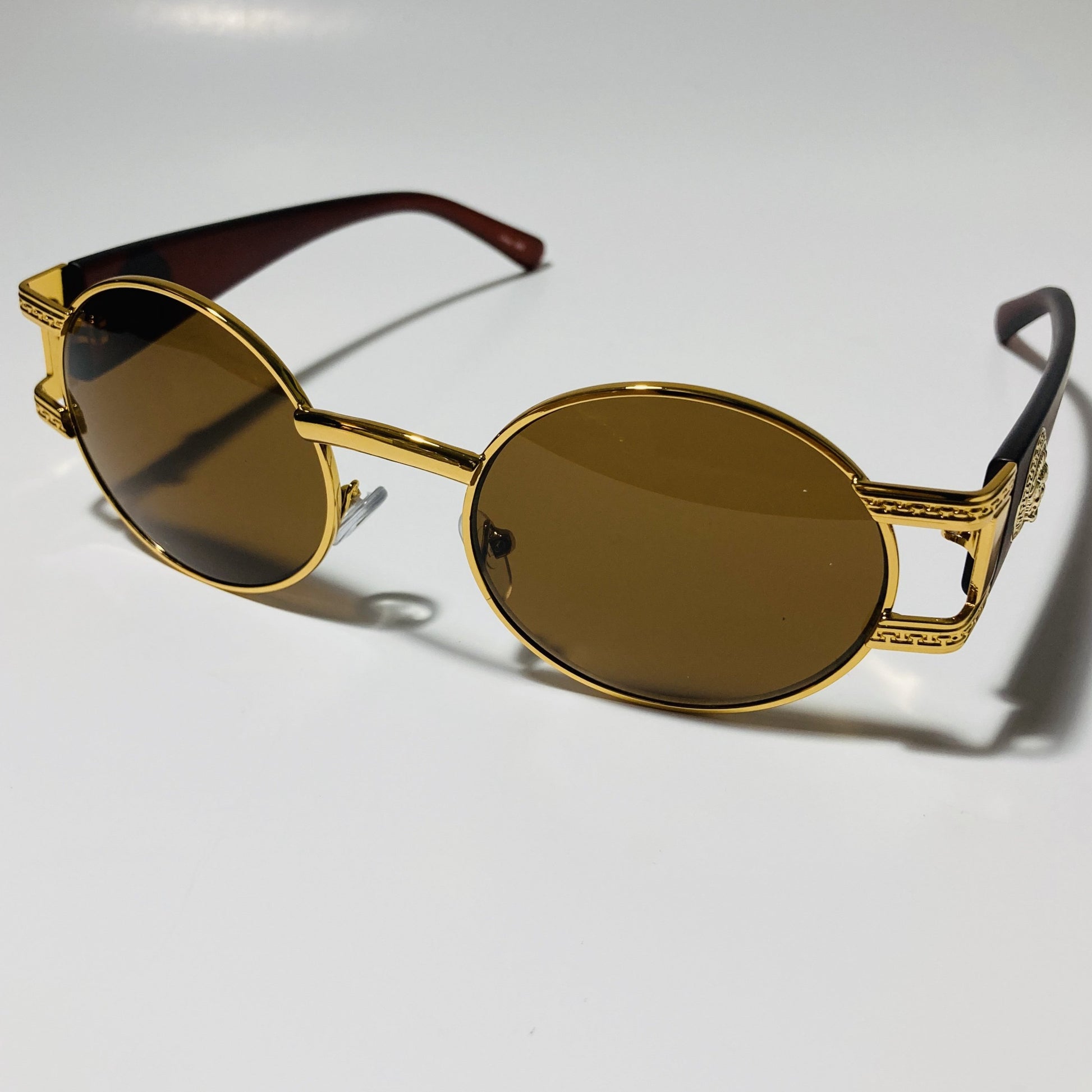 mens and womens brown and gold round sunglasses