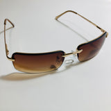 Mens and Womens Gold sunglasses with brown lenses 