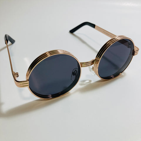 mens and womens black and gold round steampunk sunglases