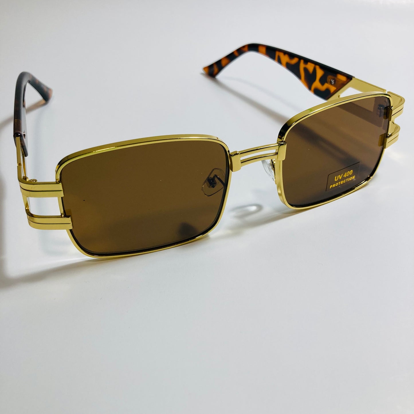 mens and womens brown and gold square sunglasses