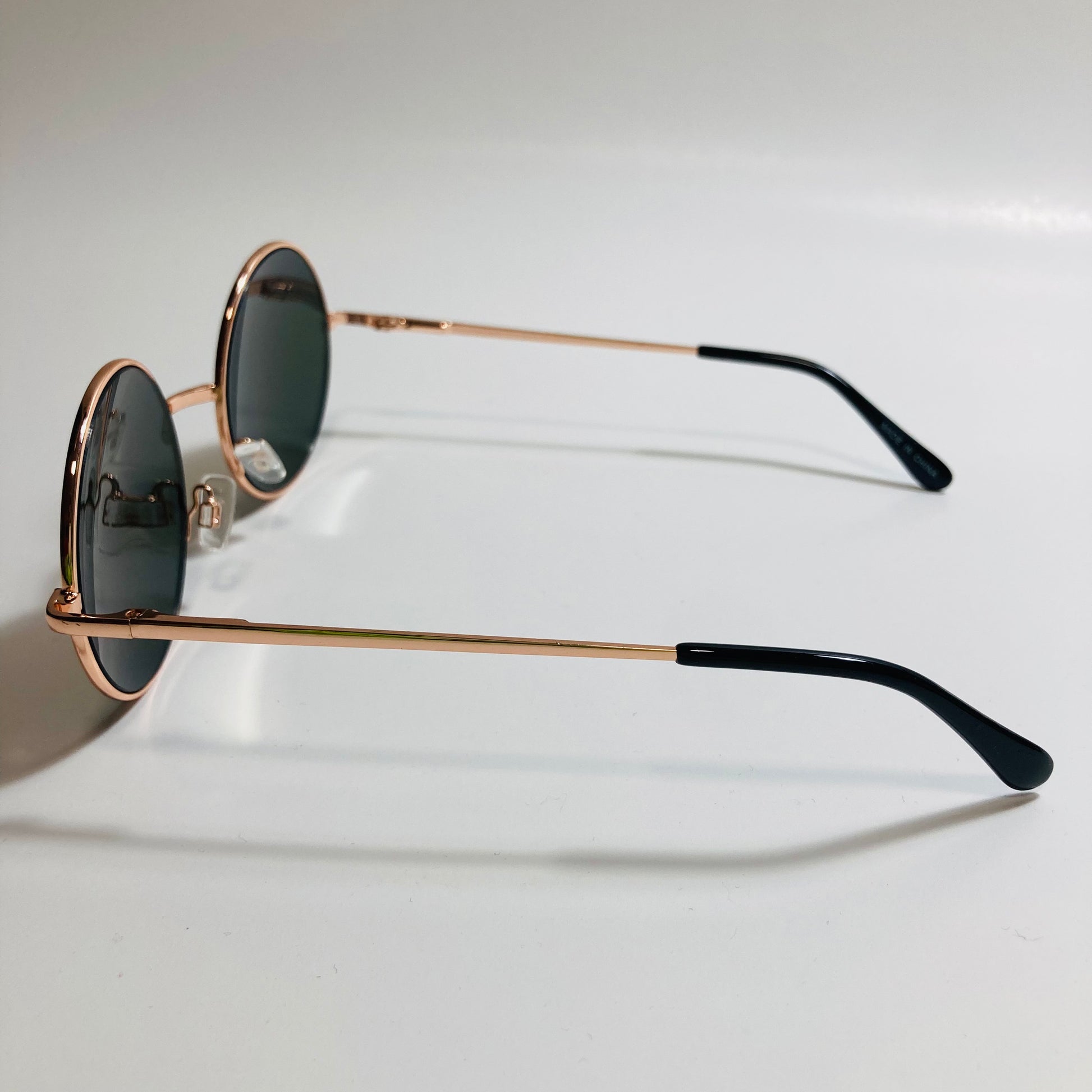 mens and womens gold and orange mirrored round sunglasses