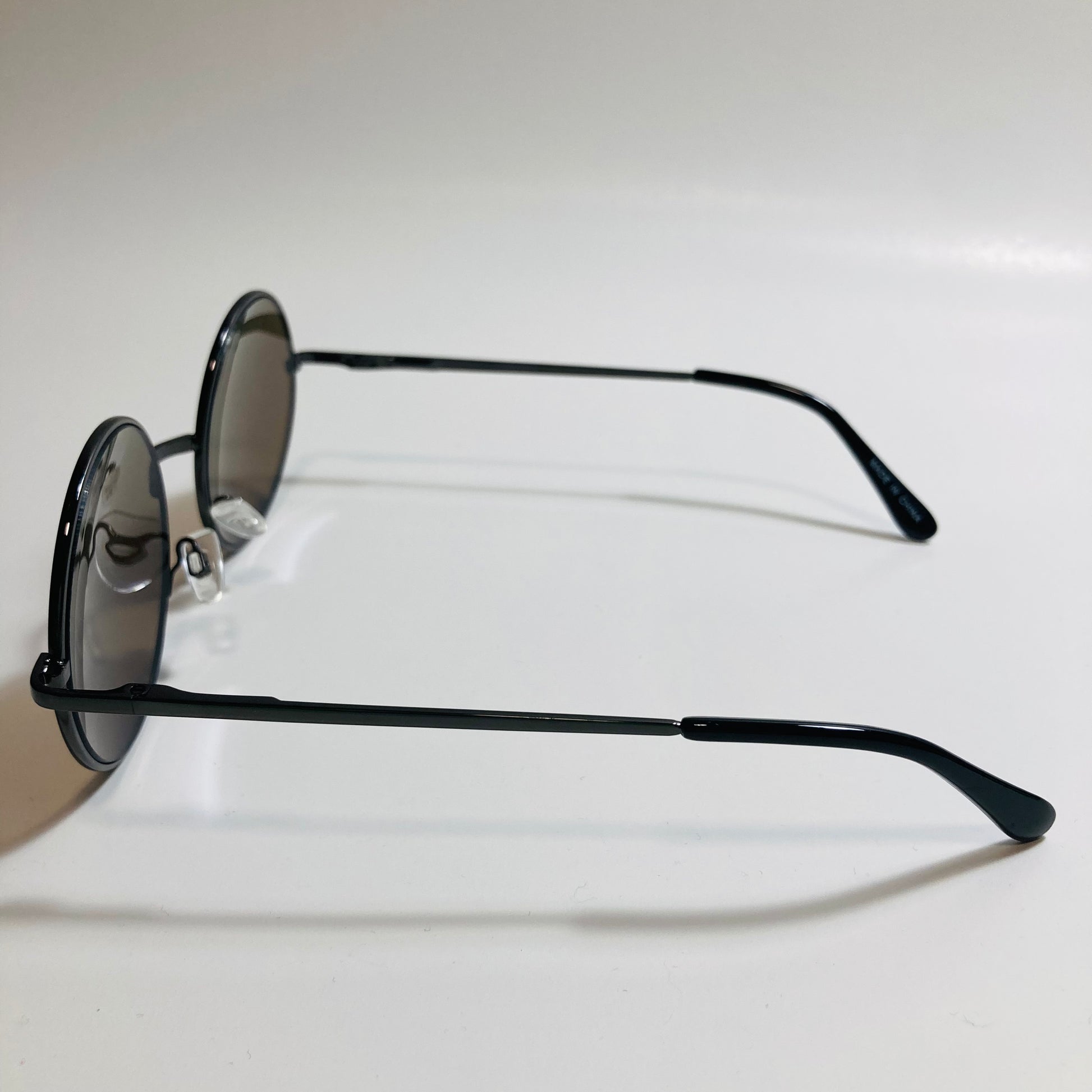 mens and womens black and blue mirrored round sunglasses